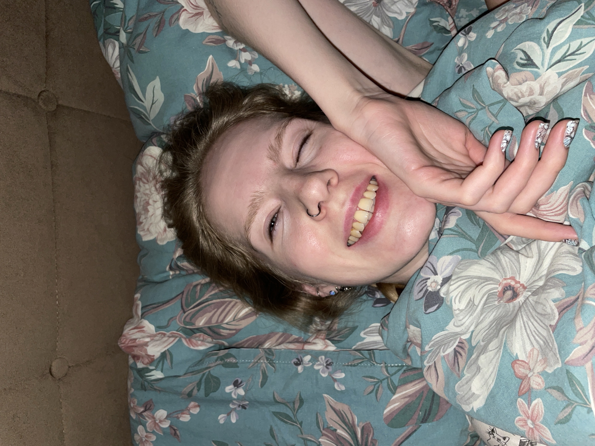 Person captured smiling in bed in Izhevsk, Russia