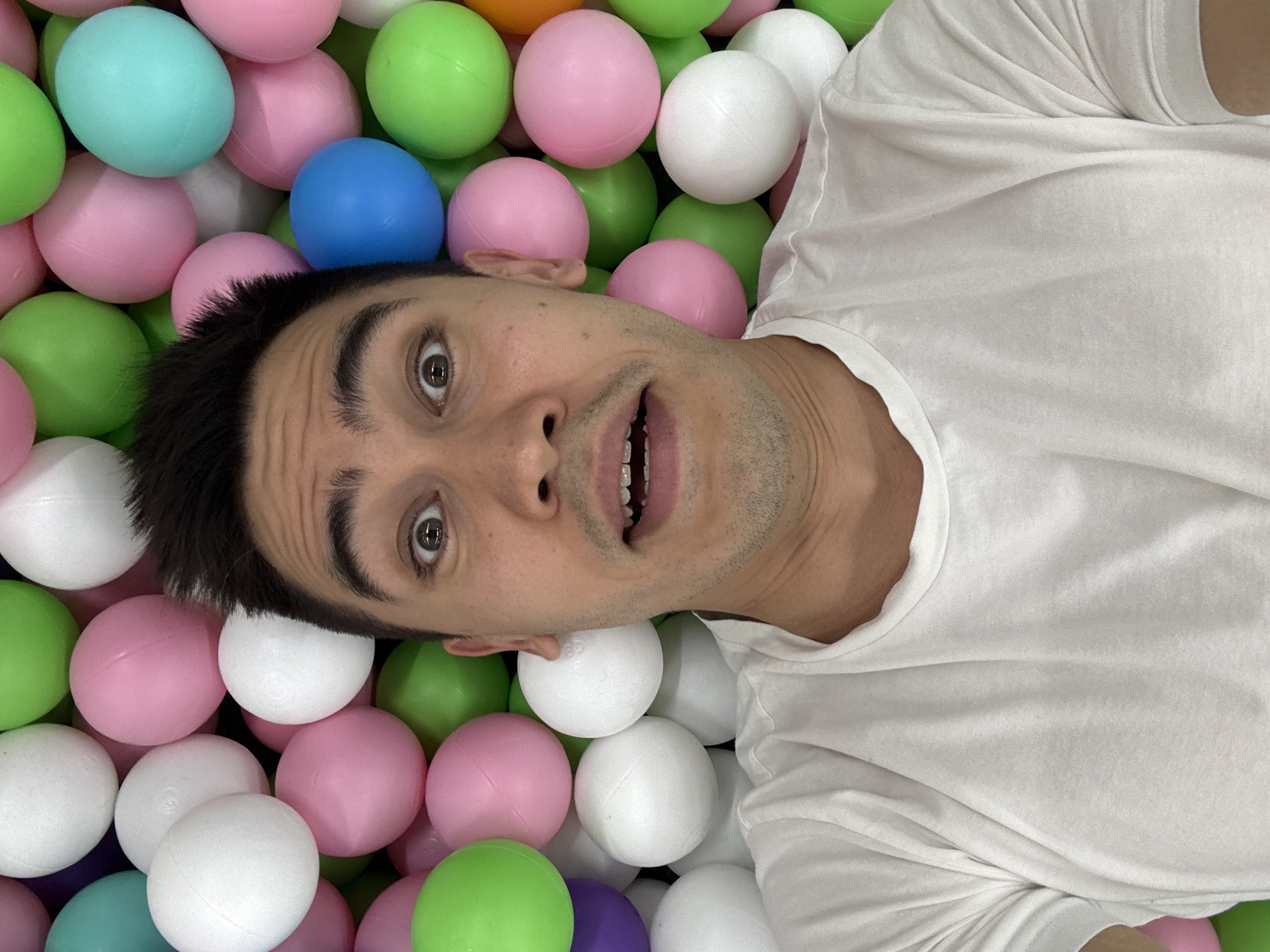 Man enjoys ball pit recreation in Kazan