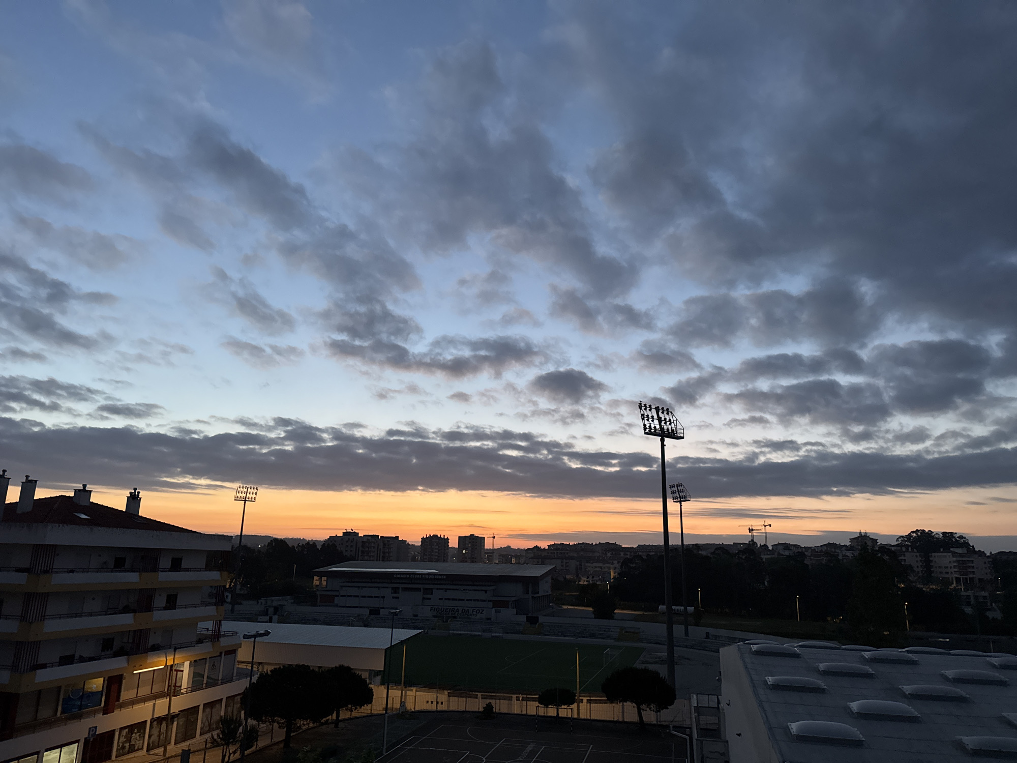 Dawn colors illuminate Figueira da Foz urban landscape