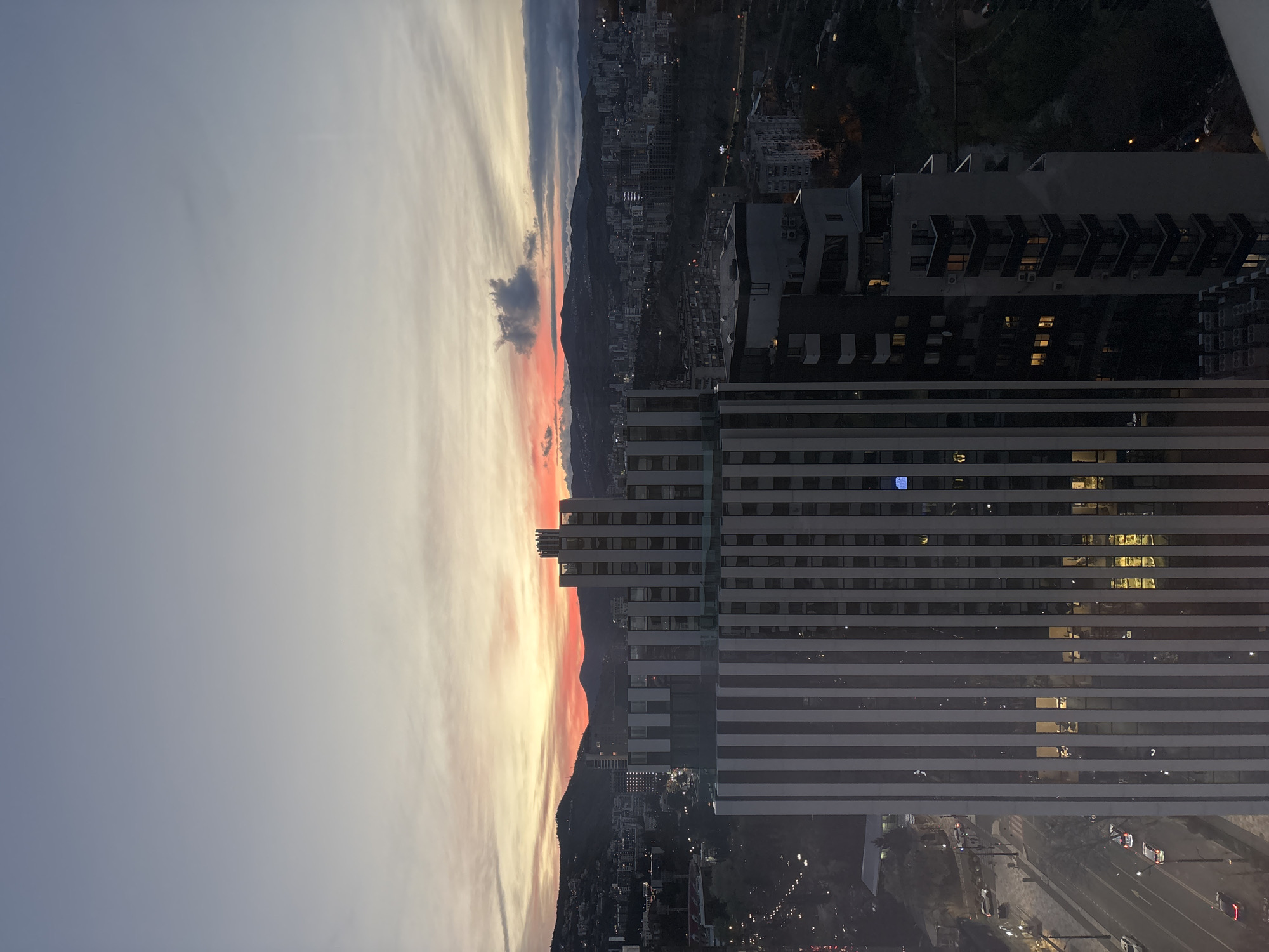 Sunset view captured over Tbilisi from elevated building position