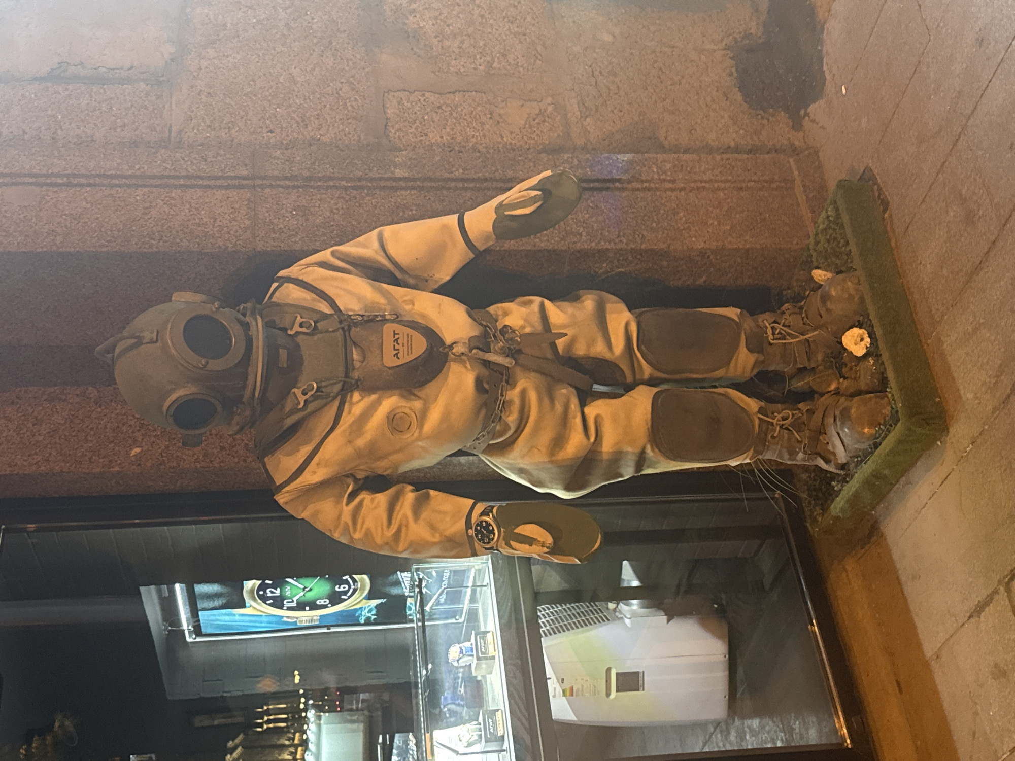 Vintage diving mannequin spotted outside Moscow storefront display