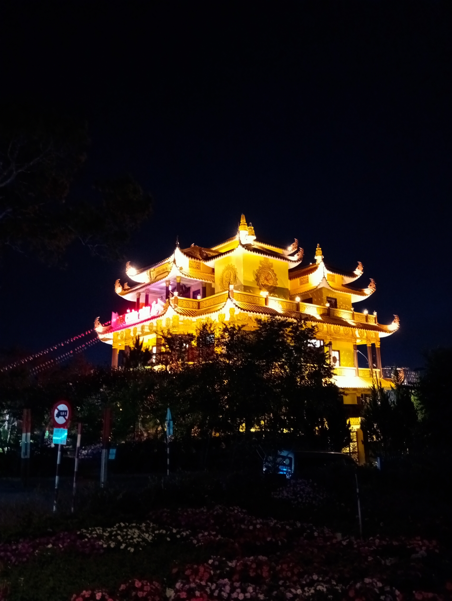 Illuminated Buddhist temple at night, Da Lat Vietnam
