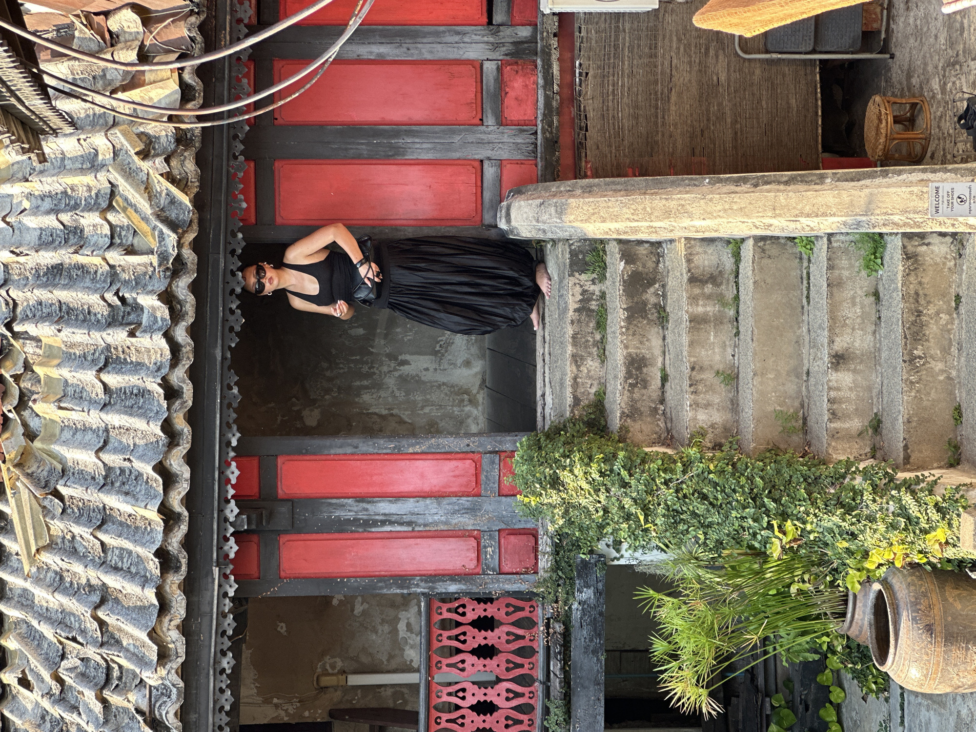 Traditional Thai building with ornate roofing documented in Bangkok