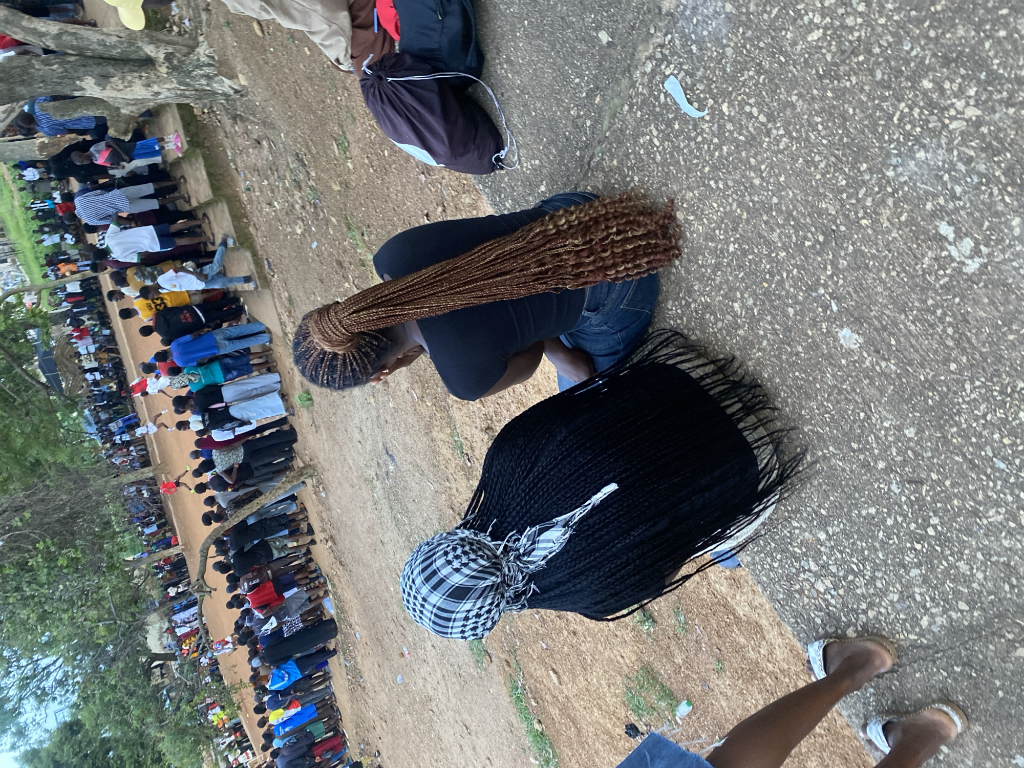 Afternoon street life and outdoor gathering in Rafin Par, Nigeria