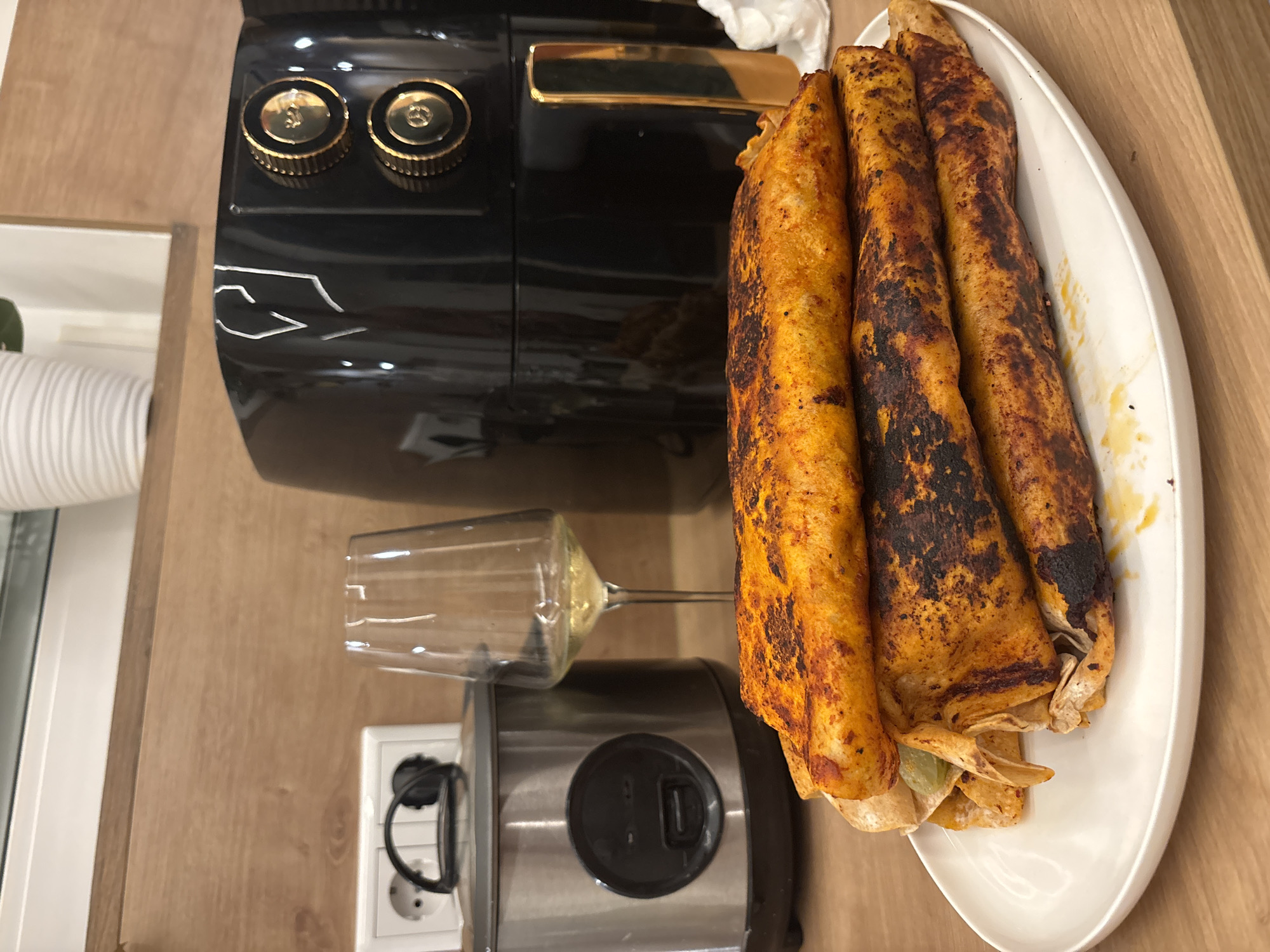 Homemade taquitos and enchiladas coming together in a Viernheim kitchen