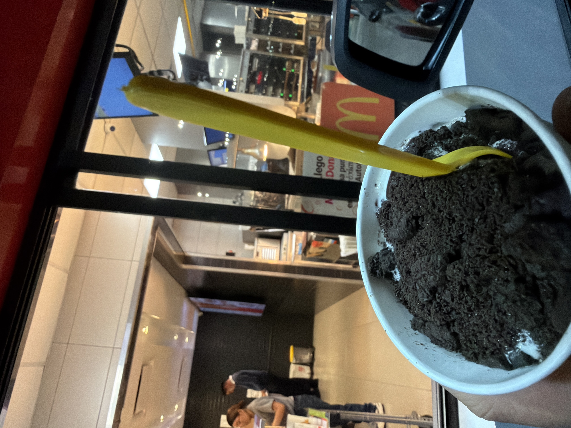 Ice cream treat with yellow spoon in Tlaxcalancingo