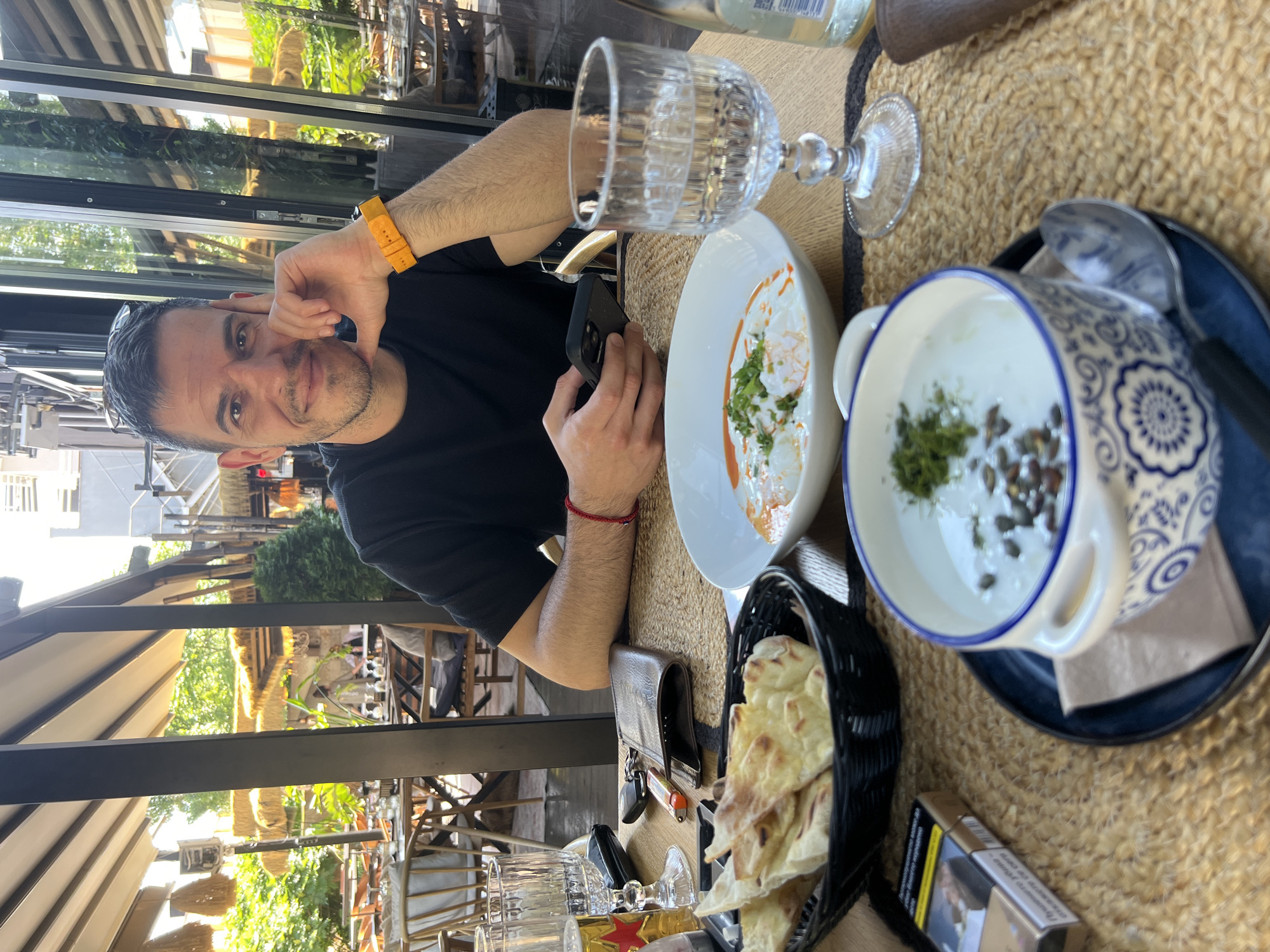 Morning meal documented at Sofia restaurant with academic paperwork