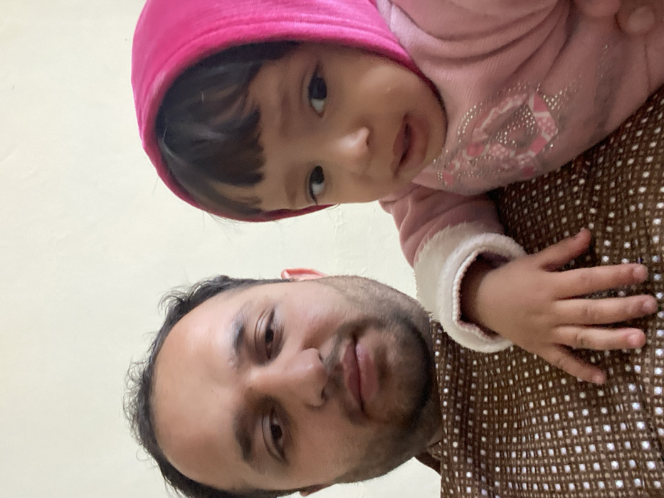 Father and child photographed in Kandahar home