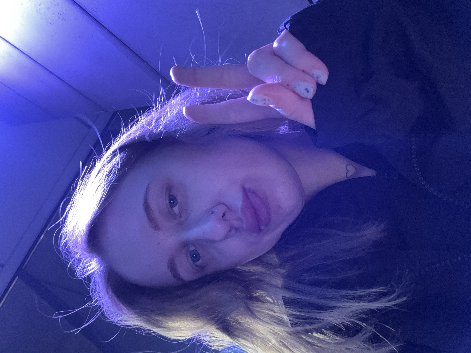 Young woman takes multiple selfies in Russian town