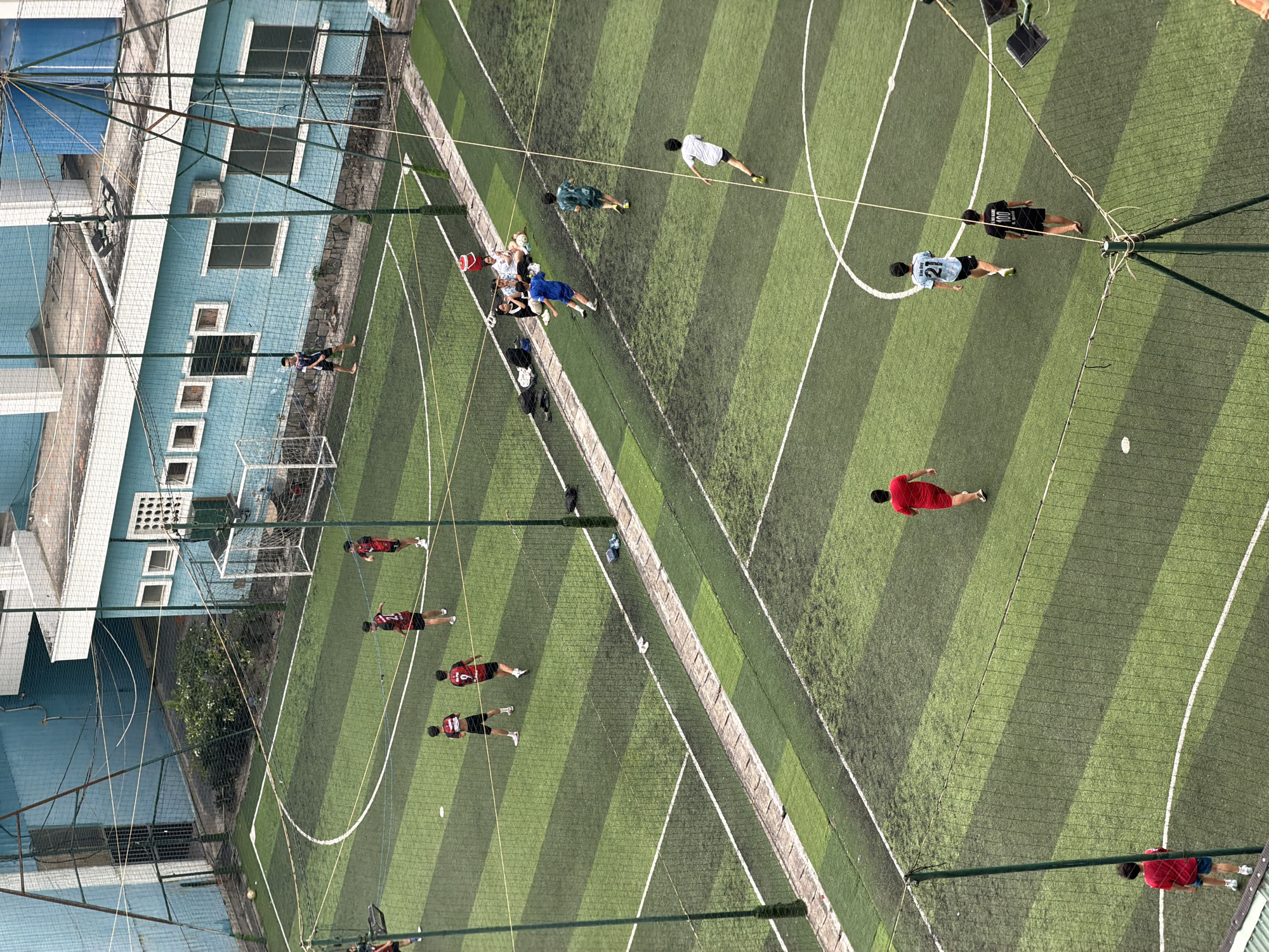 Aerial view captures soccer match, coastal scenery in Nha Trang