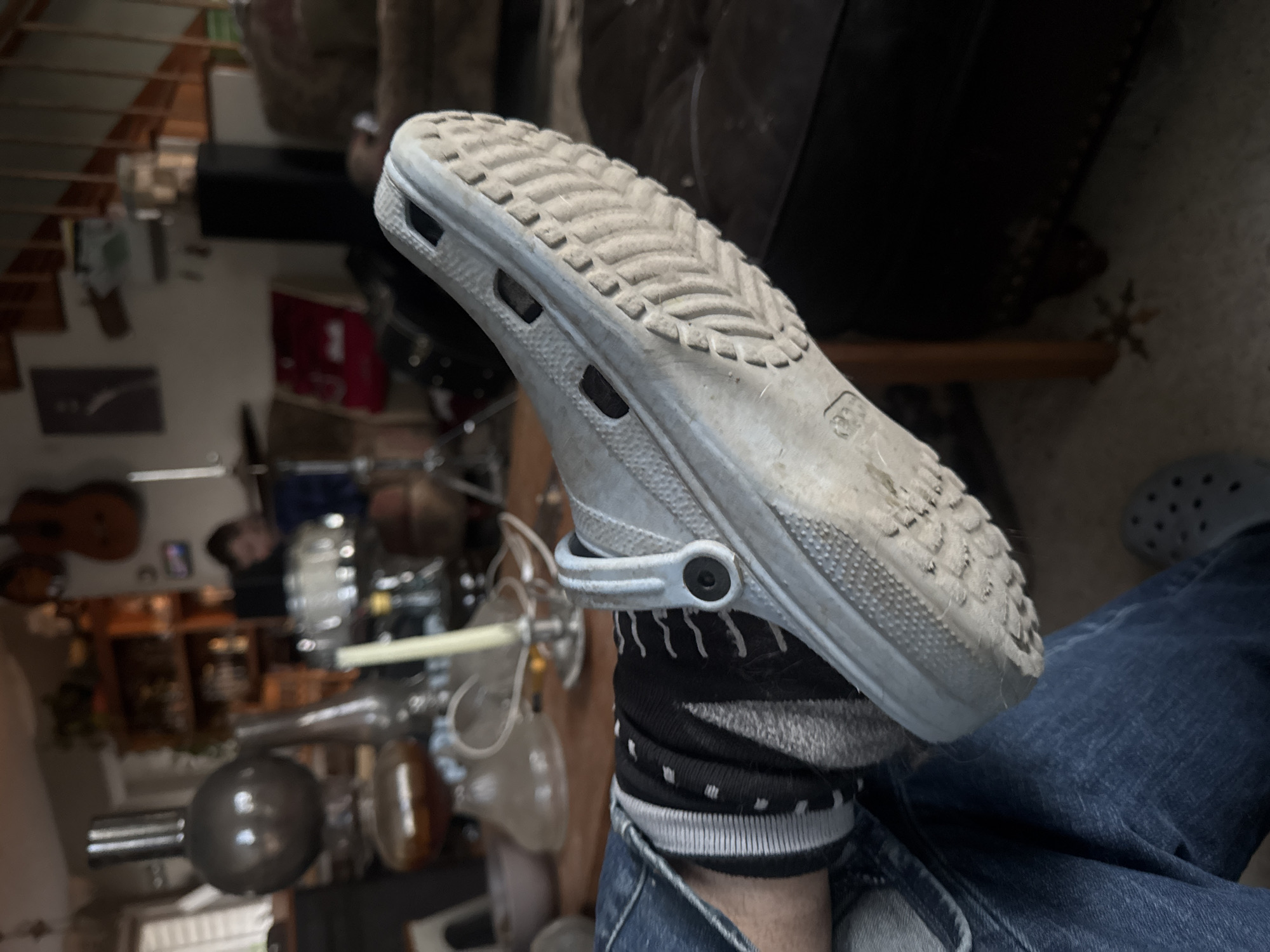 Person spotted wearing blue Crocs and striped socks in Boulder
