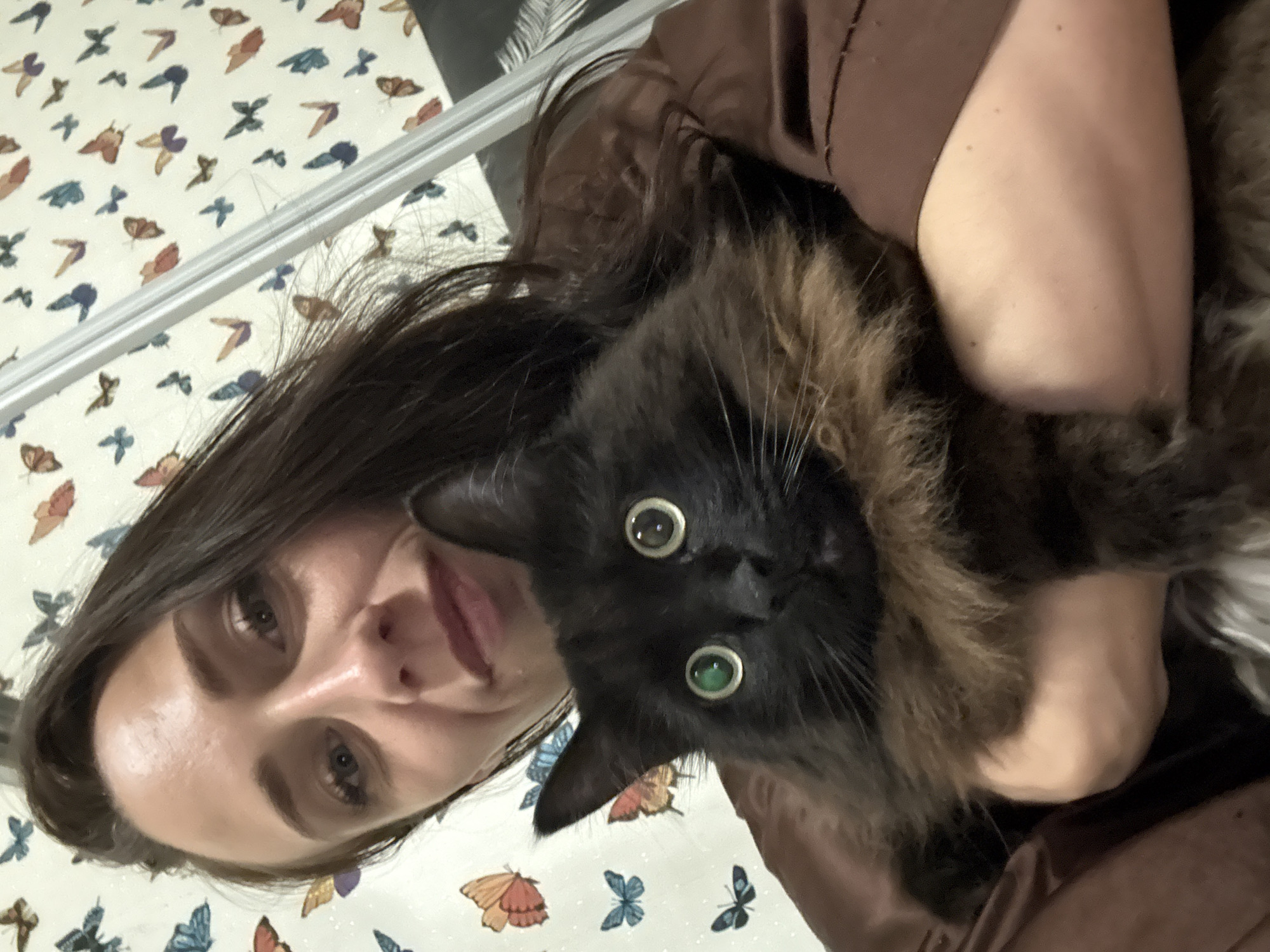 Afternoon bedroom selfies and black cat moments in Saint Petersburg