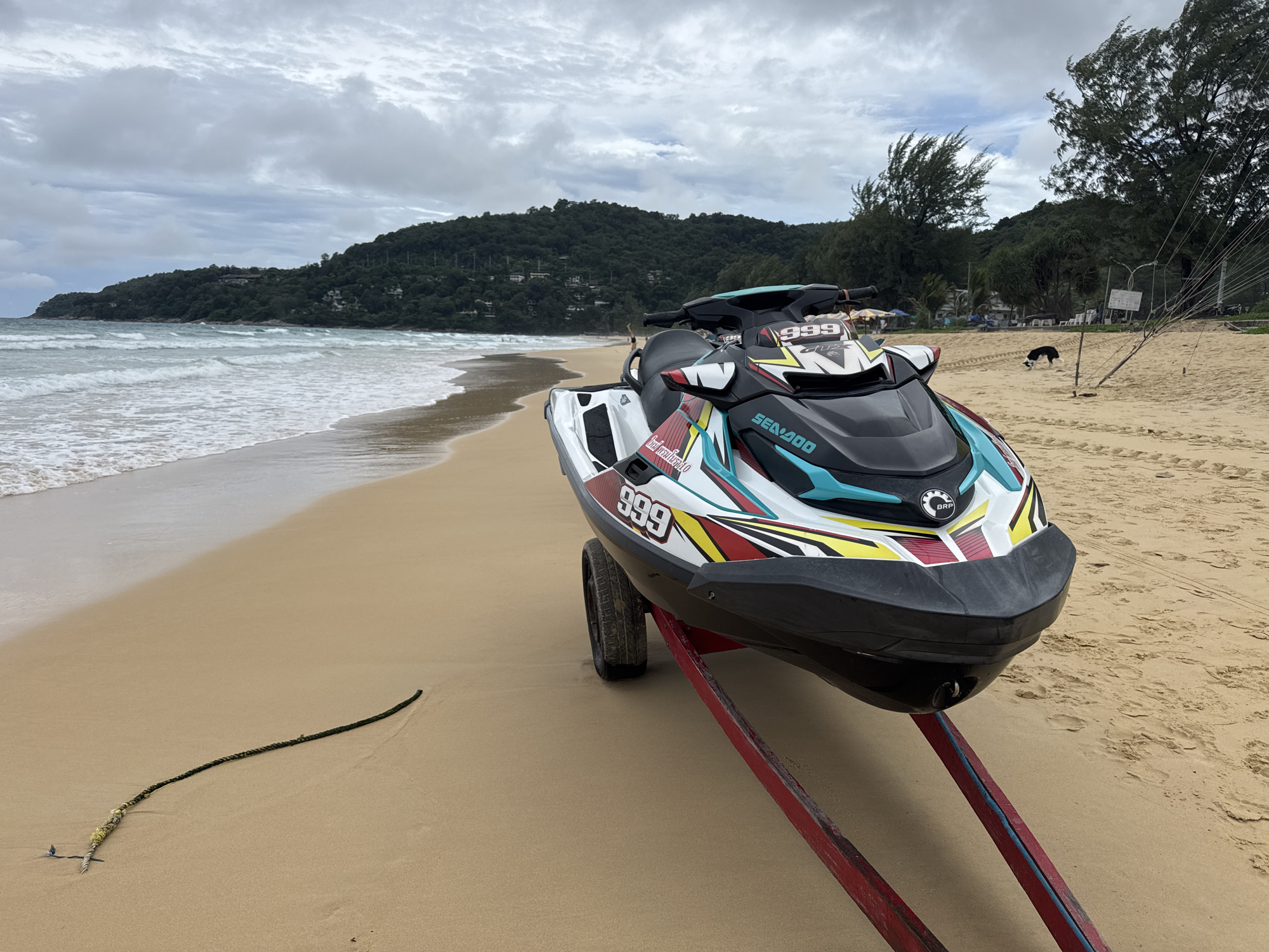 Karon Beach on a rough morning: flags up, jet skis out