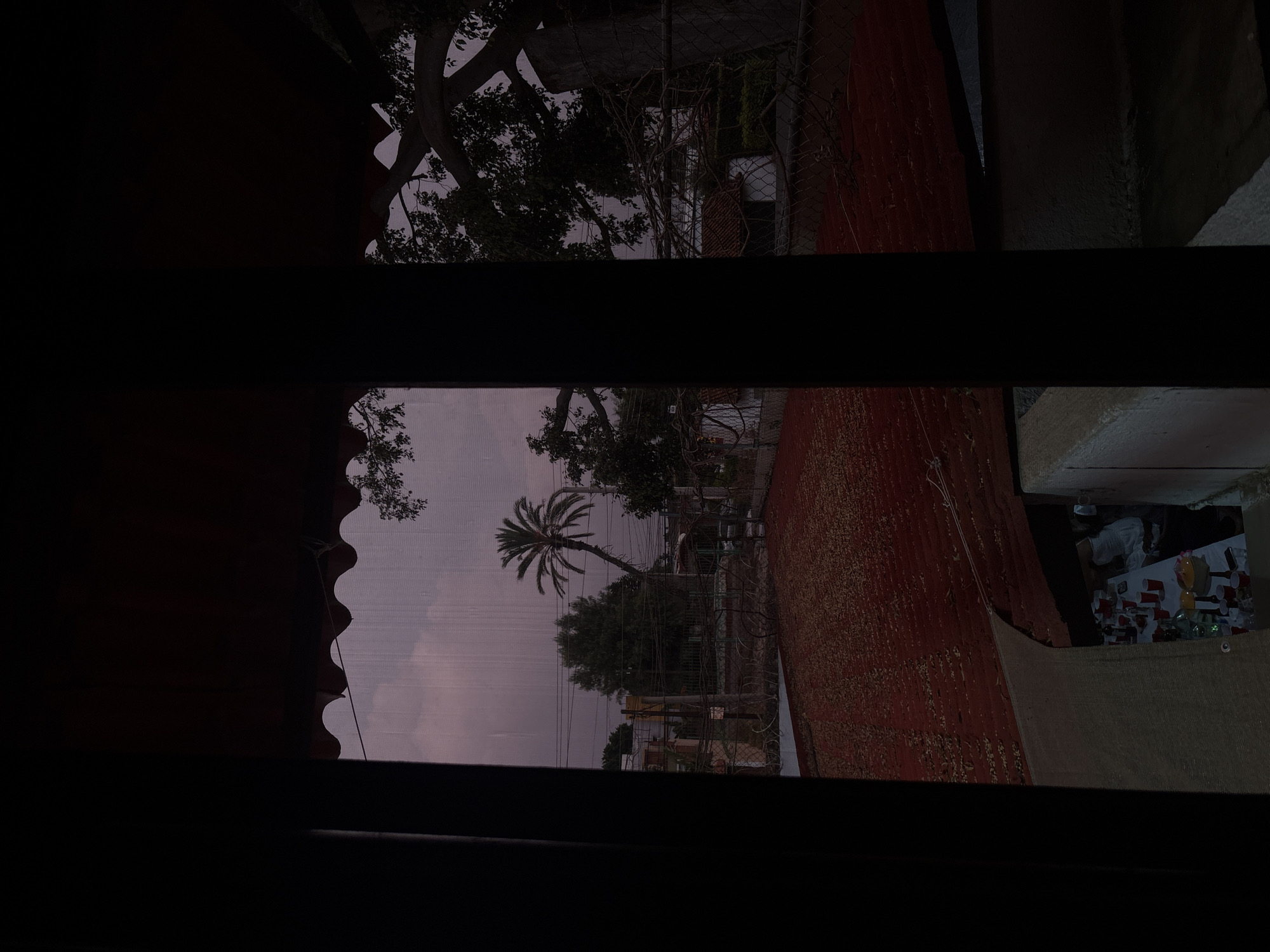 Window view captured in Oaxaca City showing local architecture
