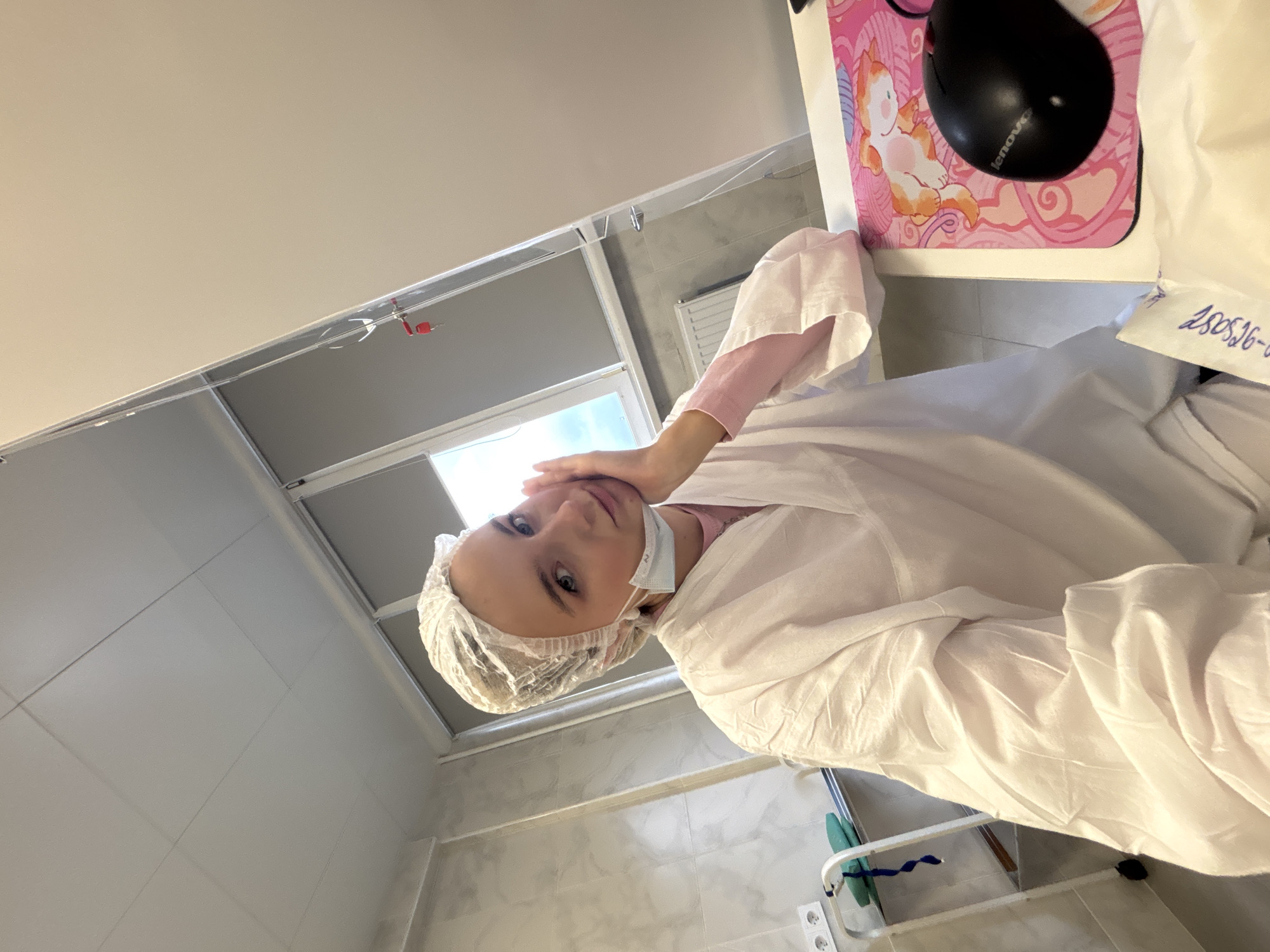 Woman in surgical attire observed at Russian medical facility