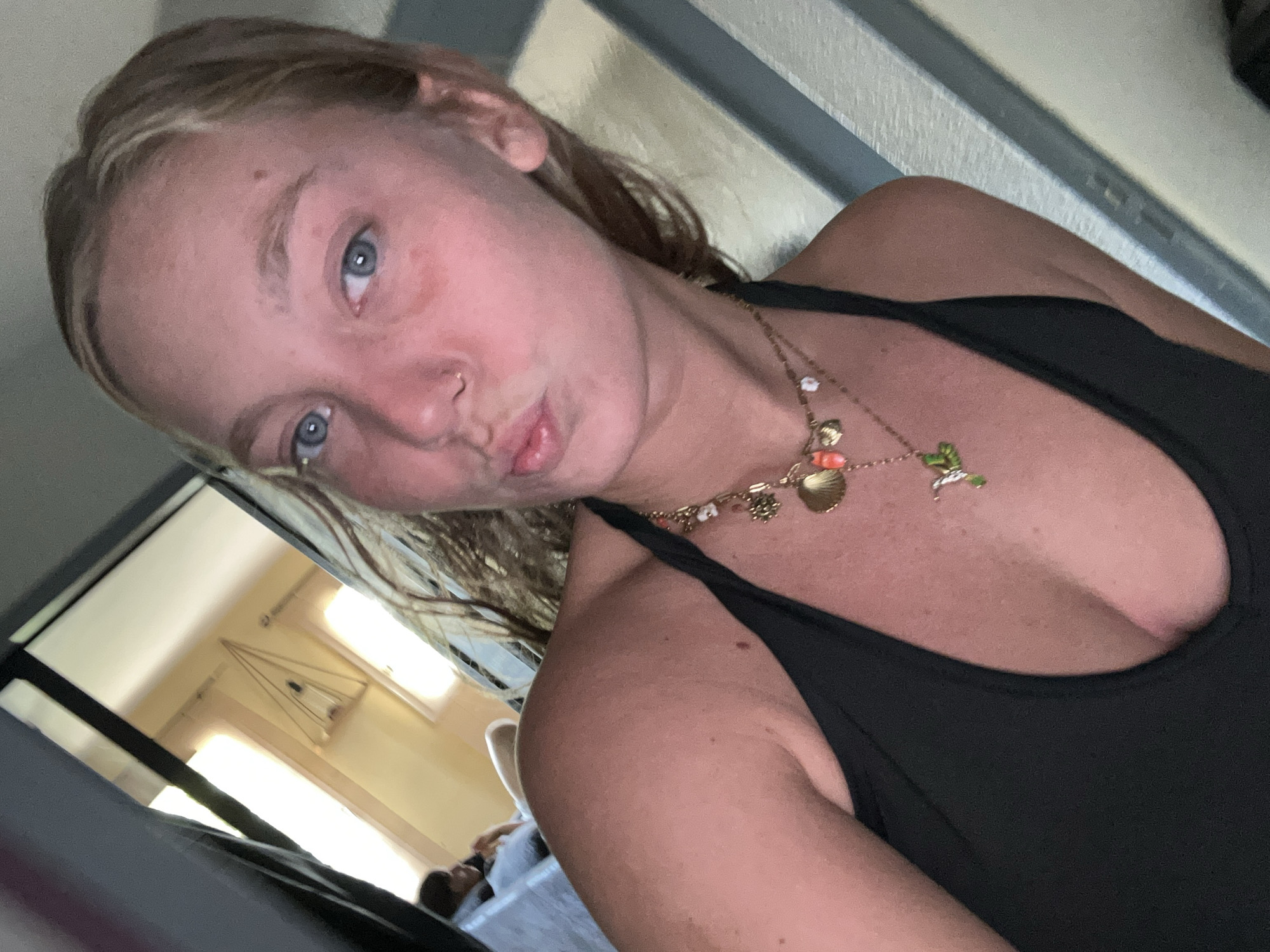 Woman takes selfies in personal room in Lannoy
