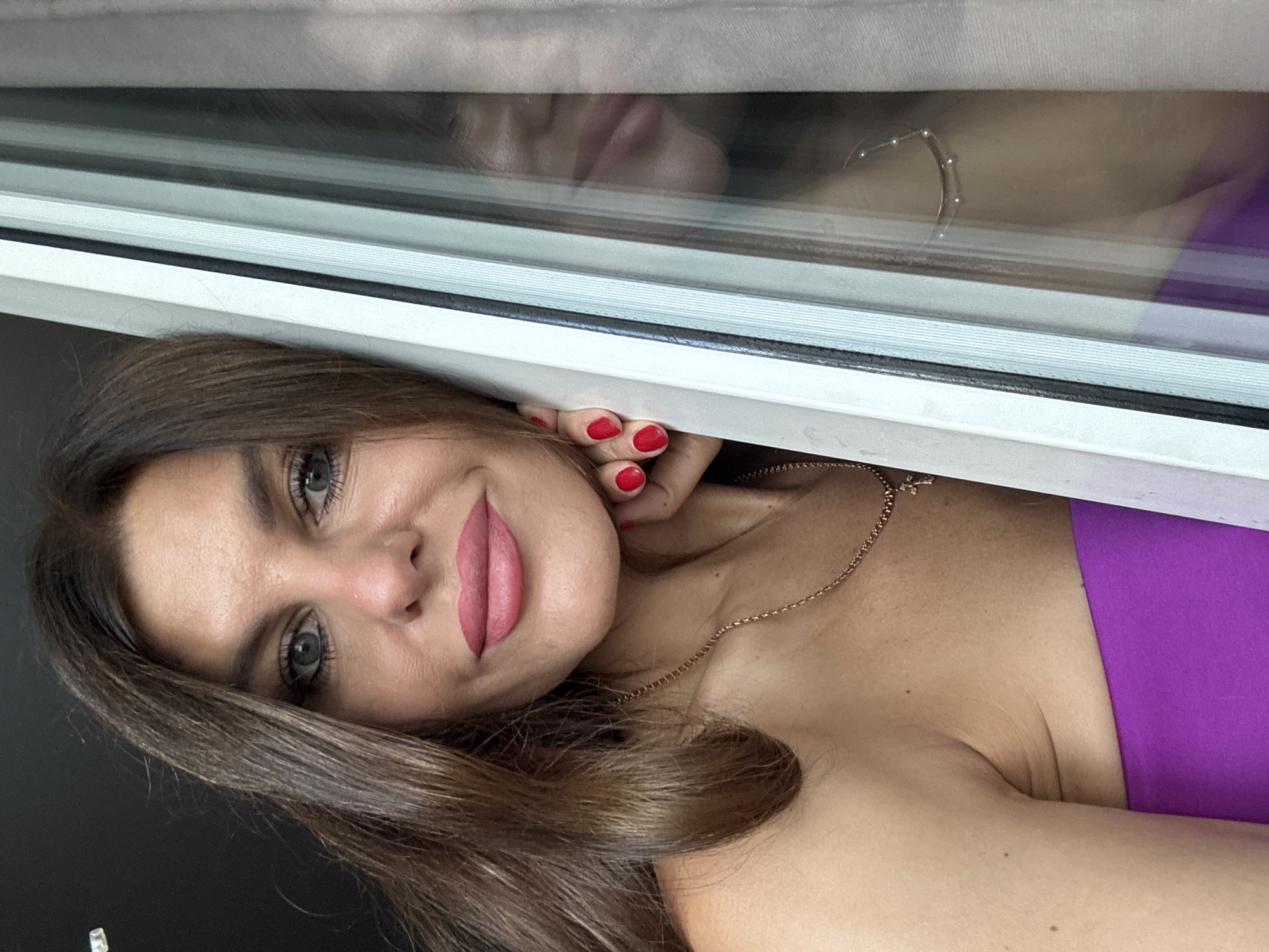 Indoor selfie session in Chaikovsky, trying out angles and looks