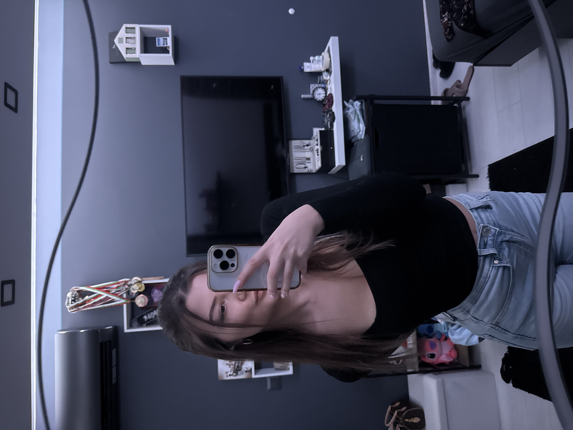 Woman takes mirror selfies in Sofia apartment Friday evening