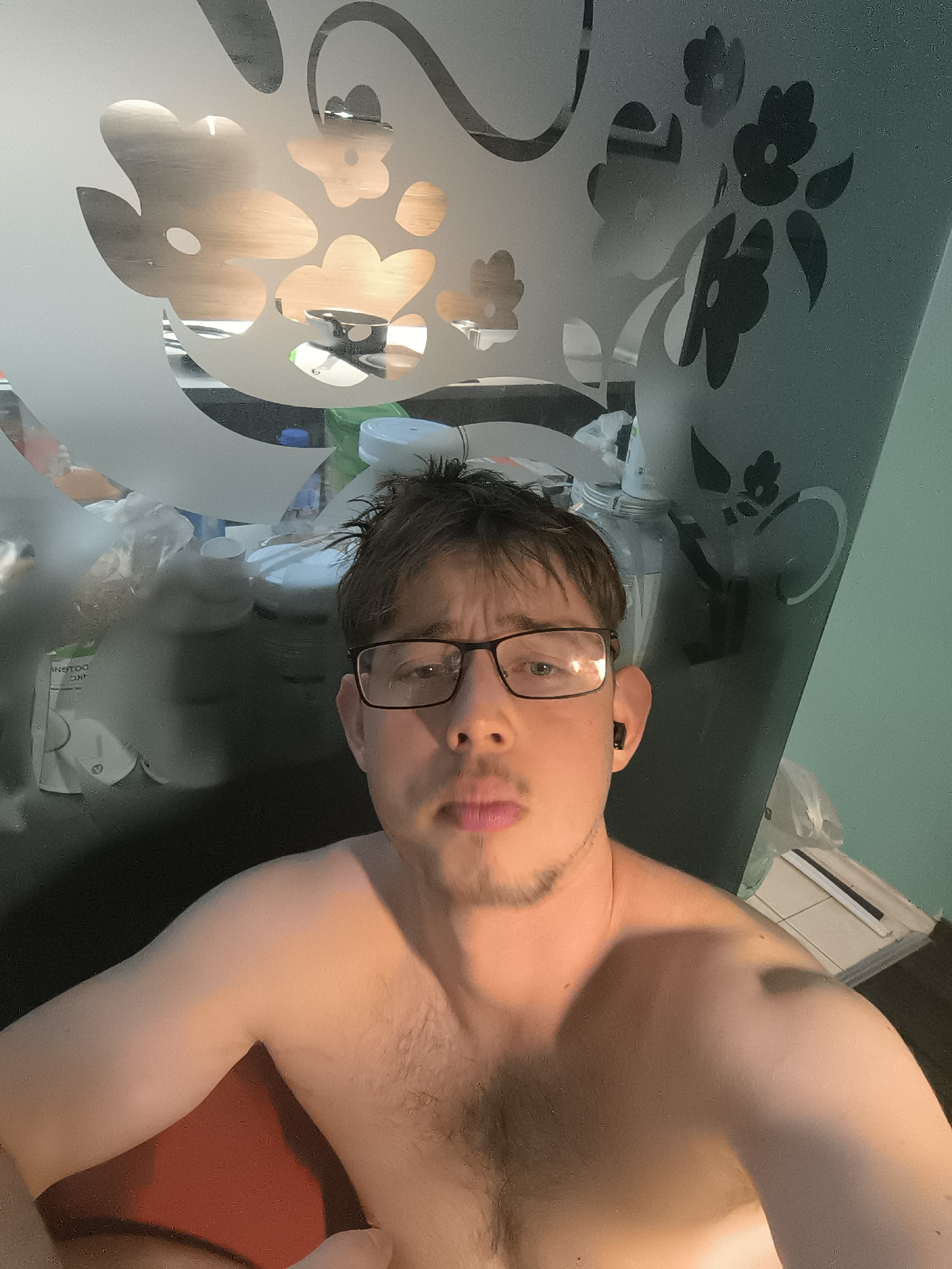 Young man takes multiple selfies in Sofia apartment