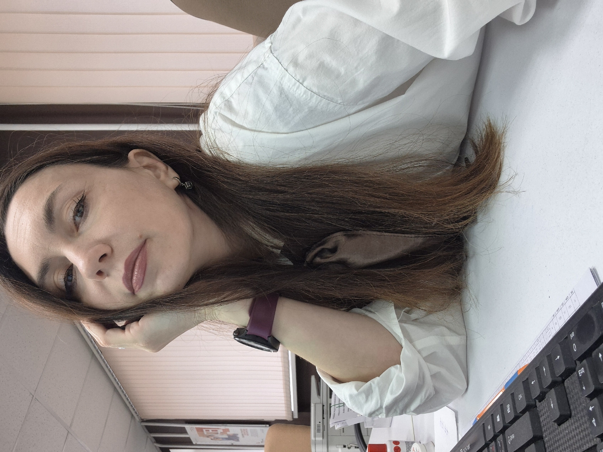Woman observed resting at desk during late night hours