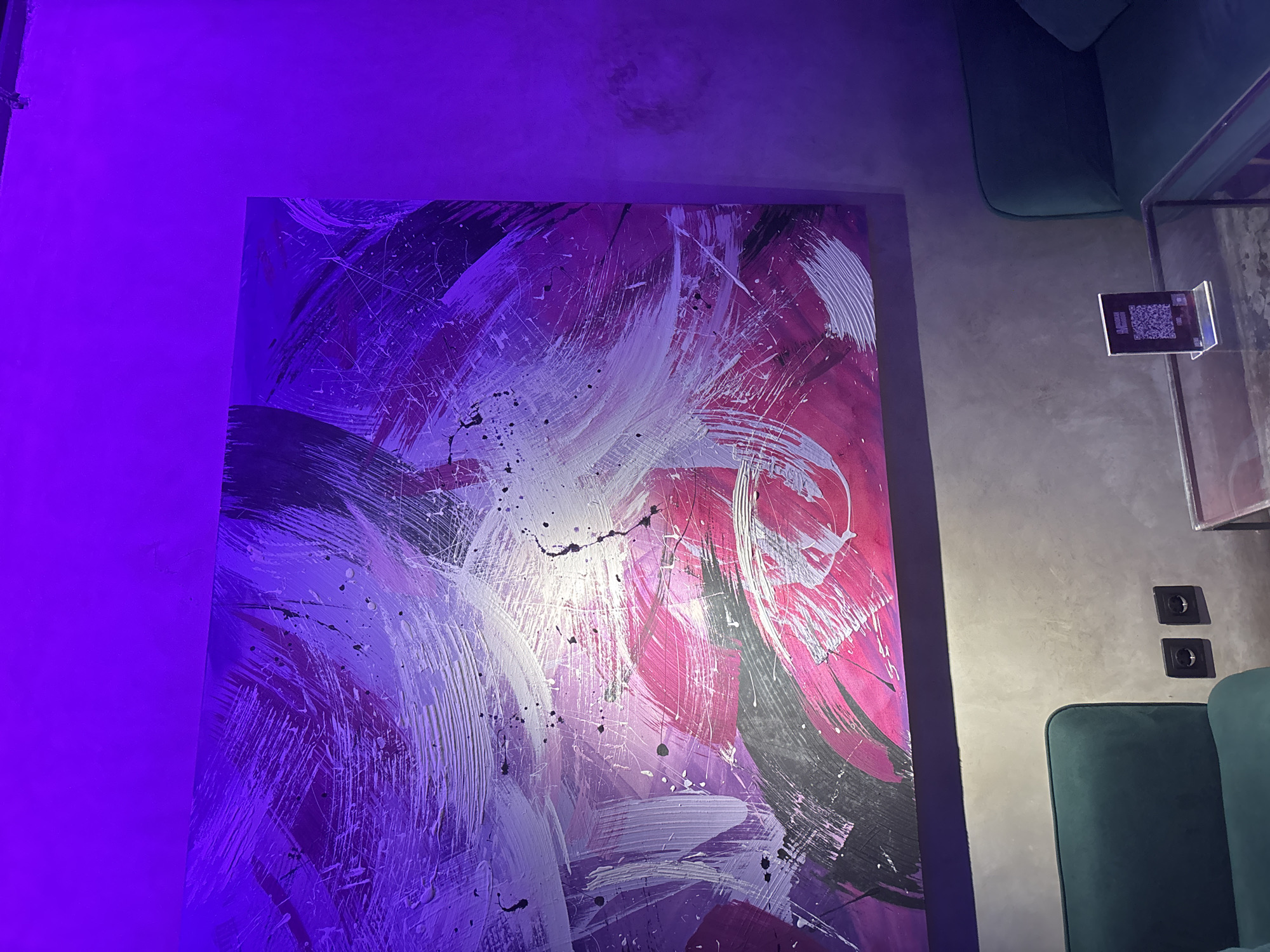 Indoor gaming setup and artwork captured in Indonesian residence