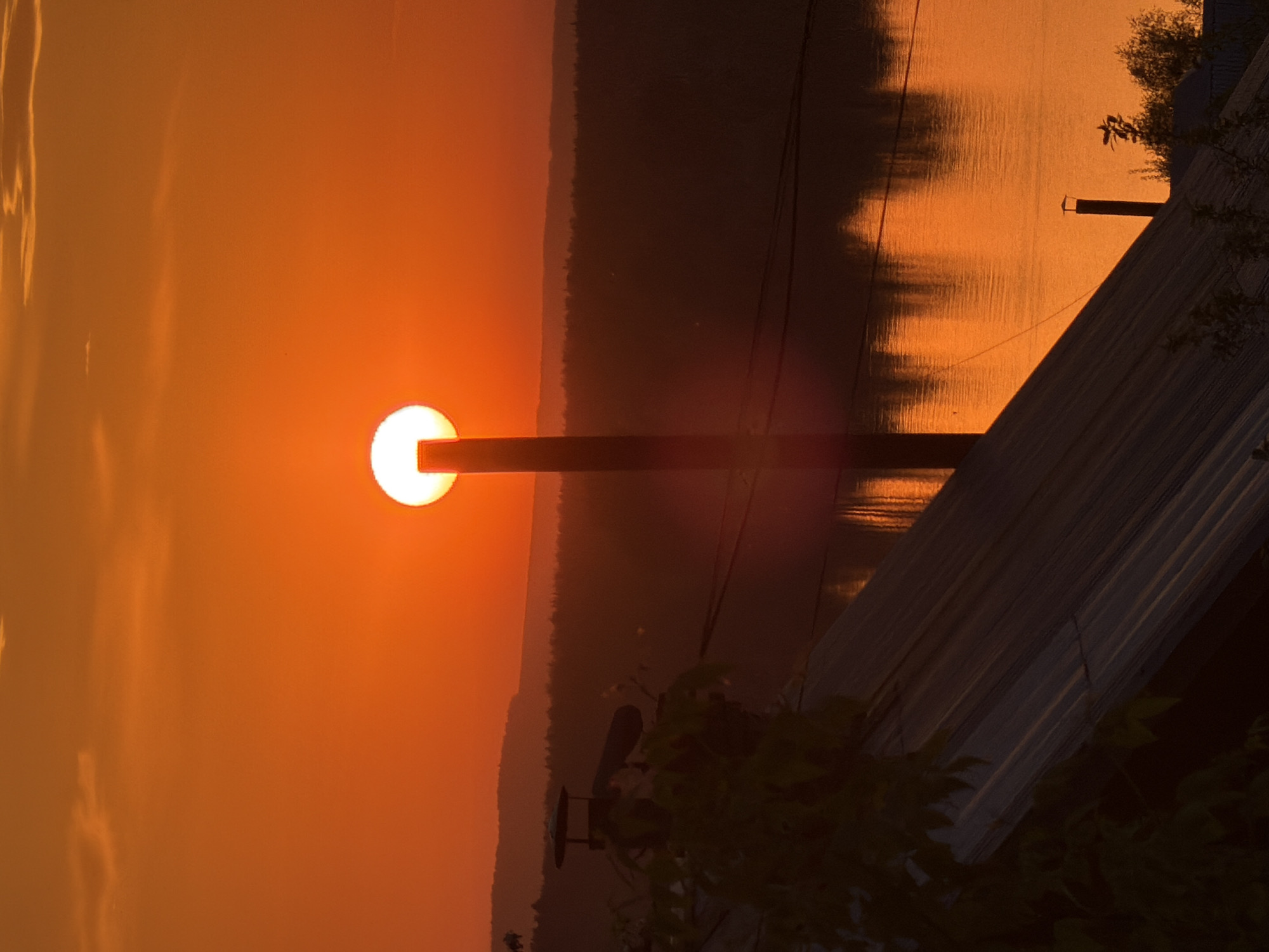 Sunset over Kama River captured by multiple witnesses in Chaikovsky