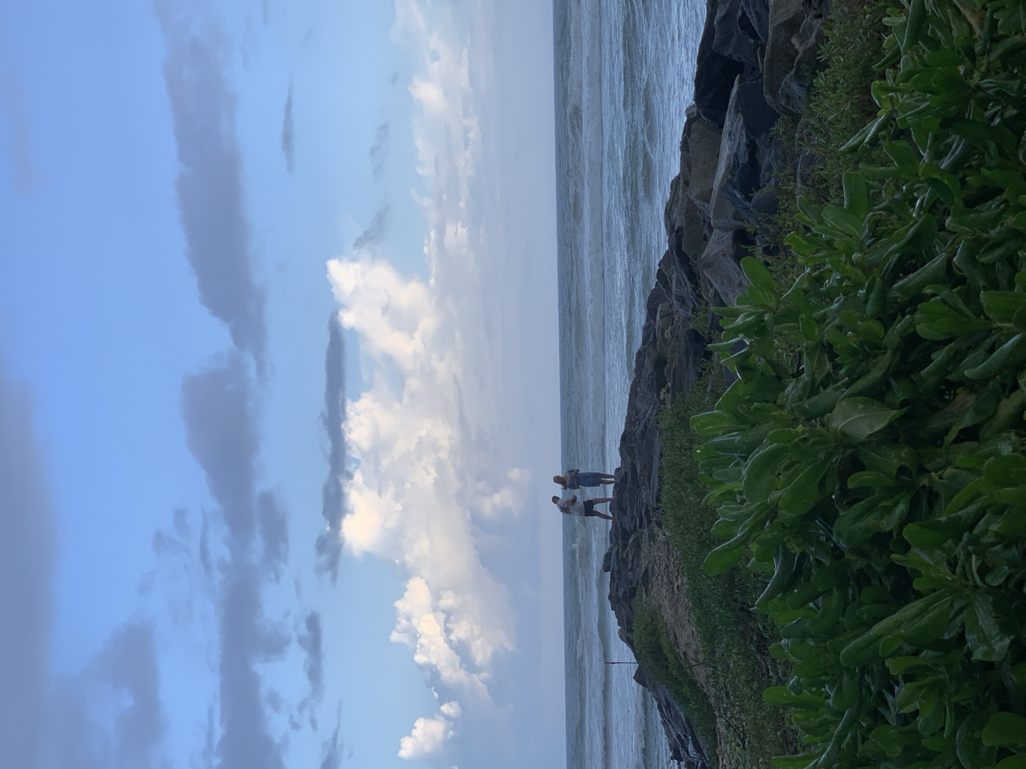Couple spotted on rocky breakwater in Ahangama, Sri Lanka