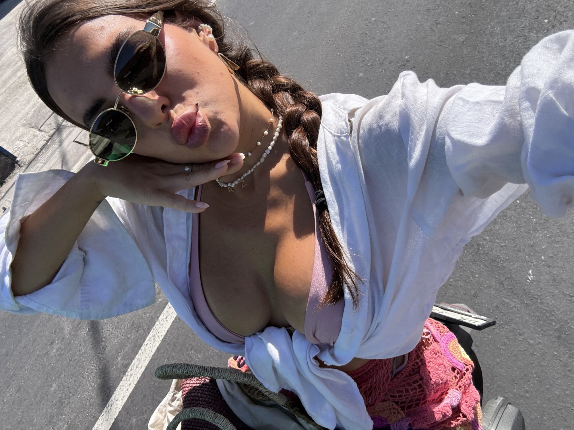 Woman takes late-night selfies around Kuta Selatan, Indonesia