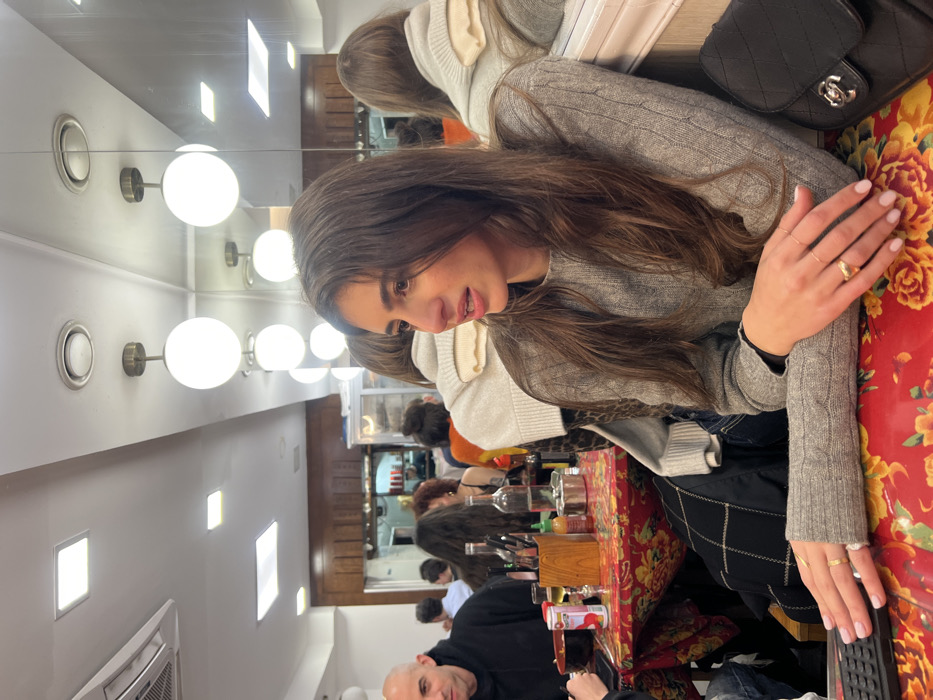 Friends share Asian dinner in Paris restaurant