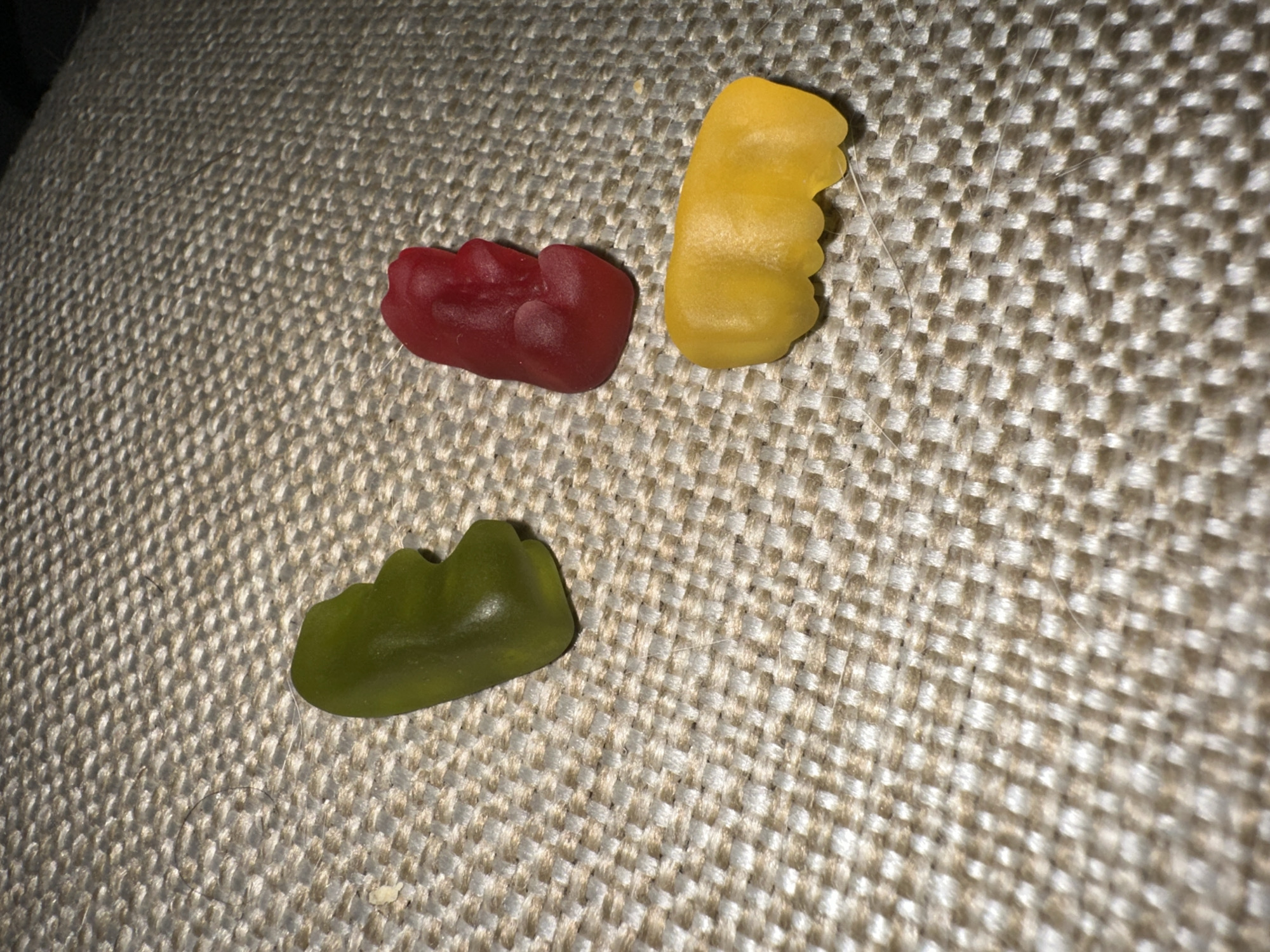 Colorful gummy candies spotted on woven surface in Buenos Aires