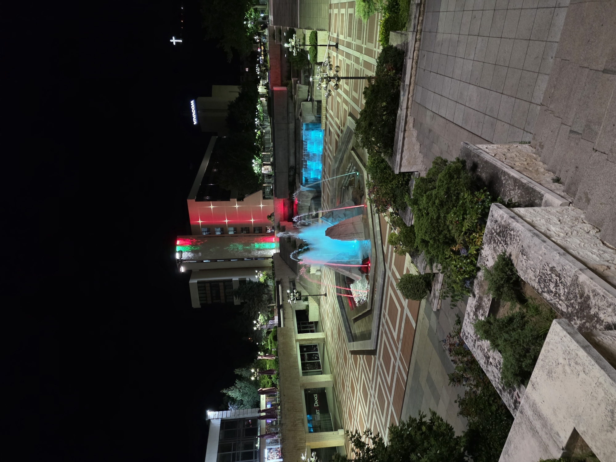 Blagoevgrad's central plaza glows at night with colorful lights