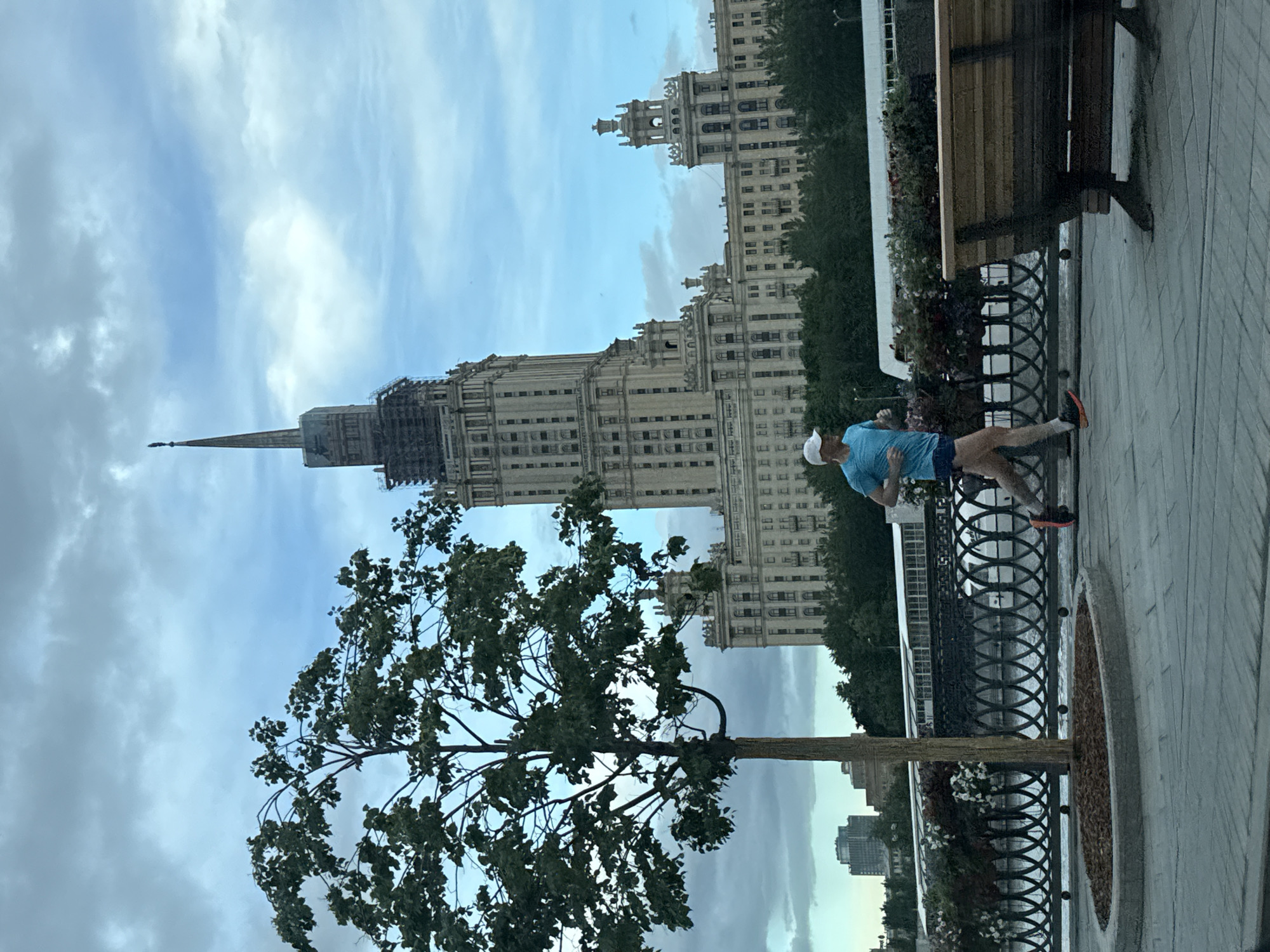 Afternoon jogging scene captured near Moscow's Kotelnicheskaya Embankment Building