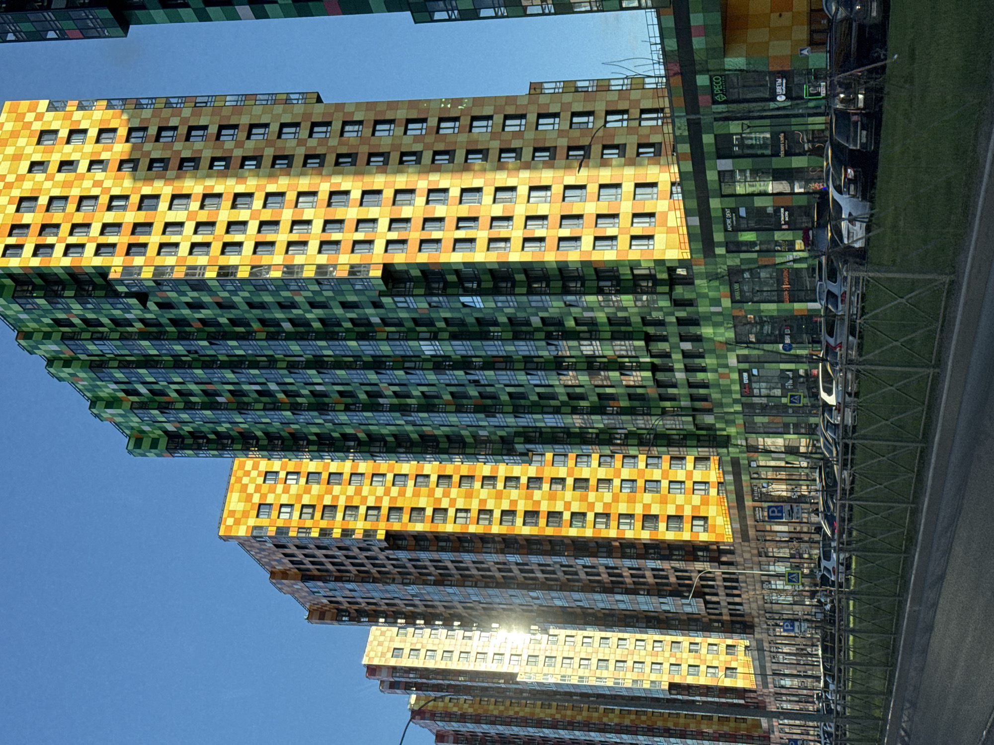Colorful checkerboard apartment buildings observed in Saint Petersburg