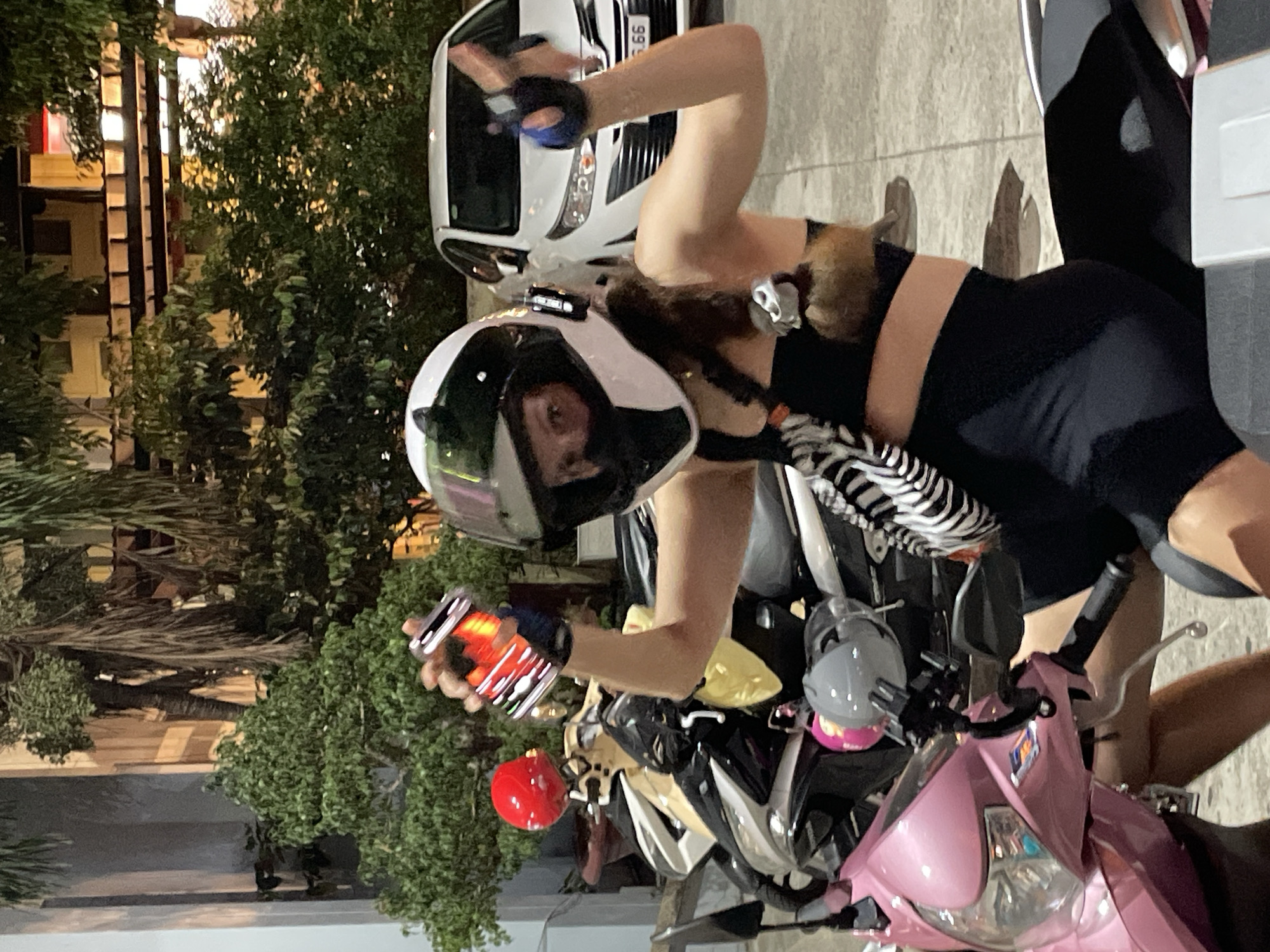 Night ride on a pink scooter through Nha Trang