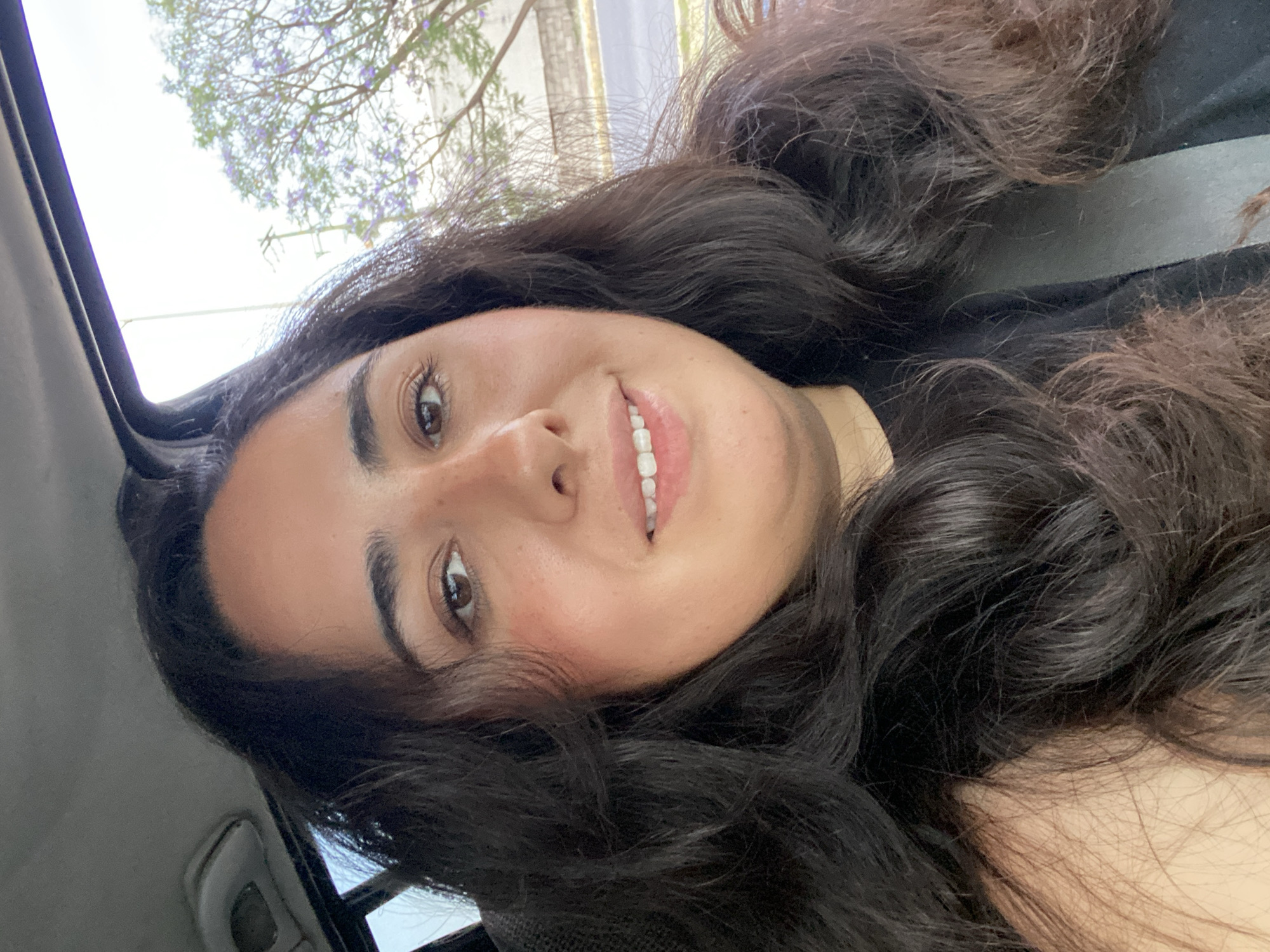 Woman captures selfie through sunroof in Tlaxcalancingo, Mexico
