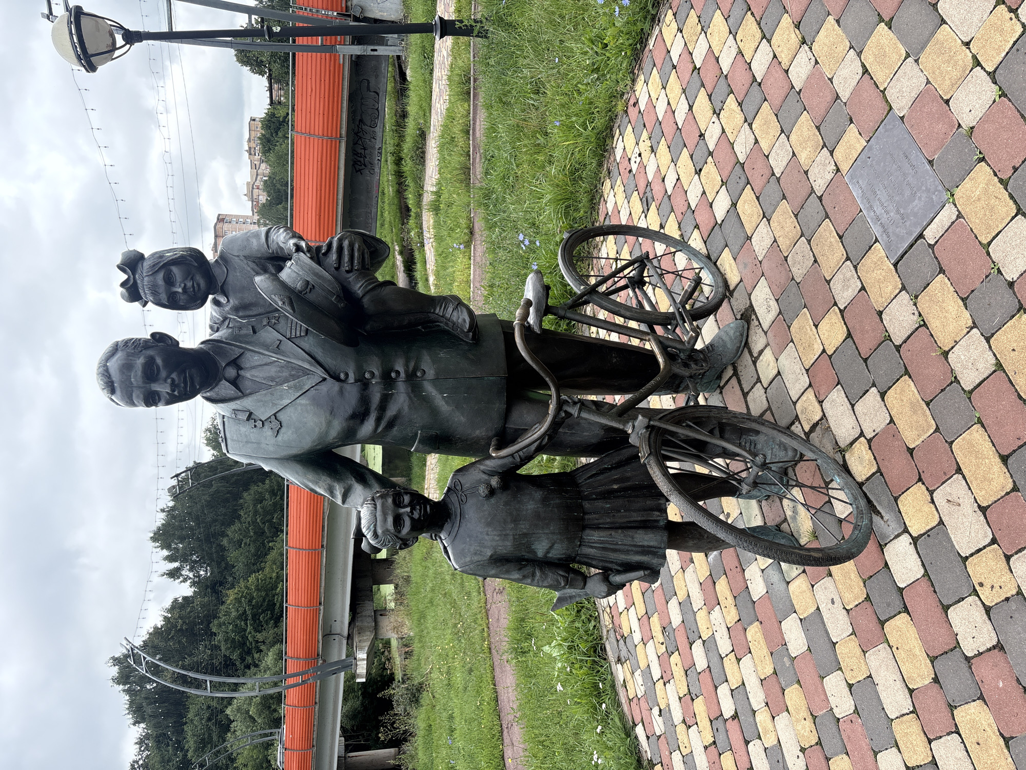 Gagarin statue and algae-covered canal in Sverdlovskiy