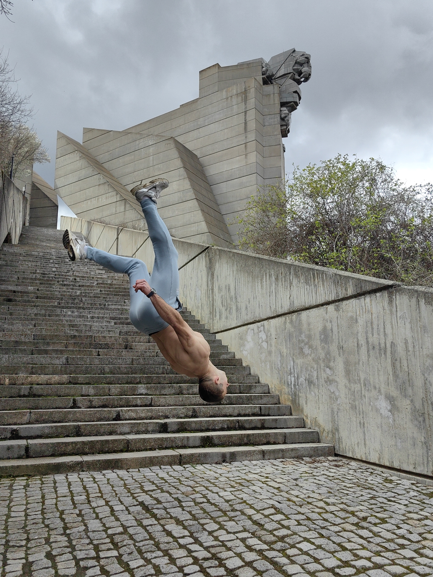 Person walks on edges of Bulgarian monument stairs
