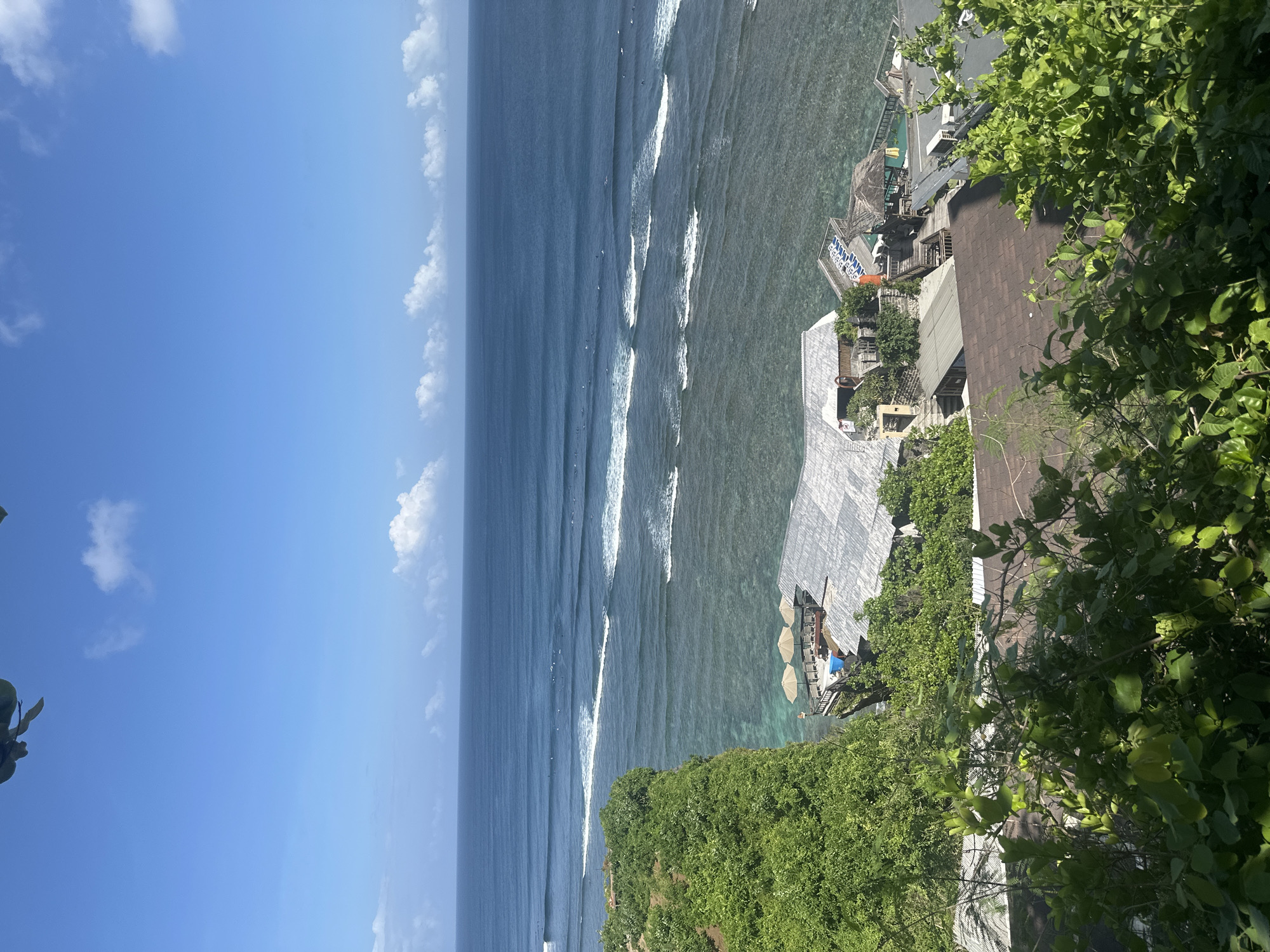 Surfers spotted in early morning waters off Kuta Selatan