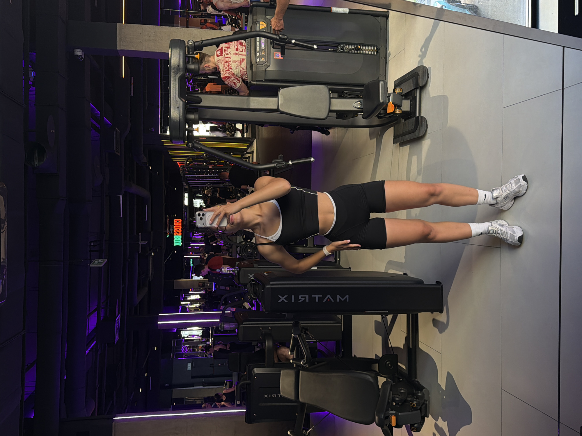 Woman Takes Mirror Selfies at Podolsk Gym
