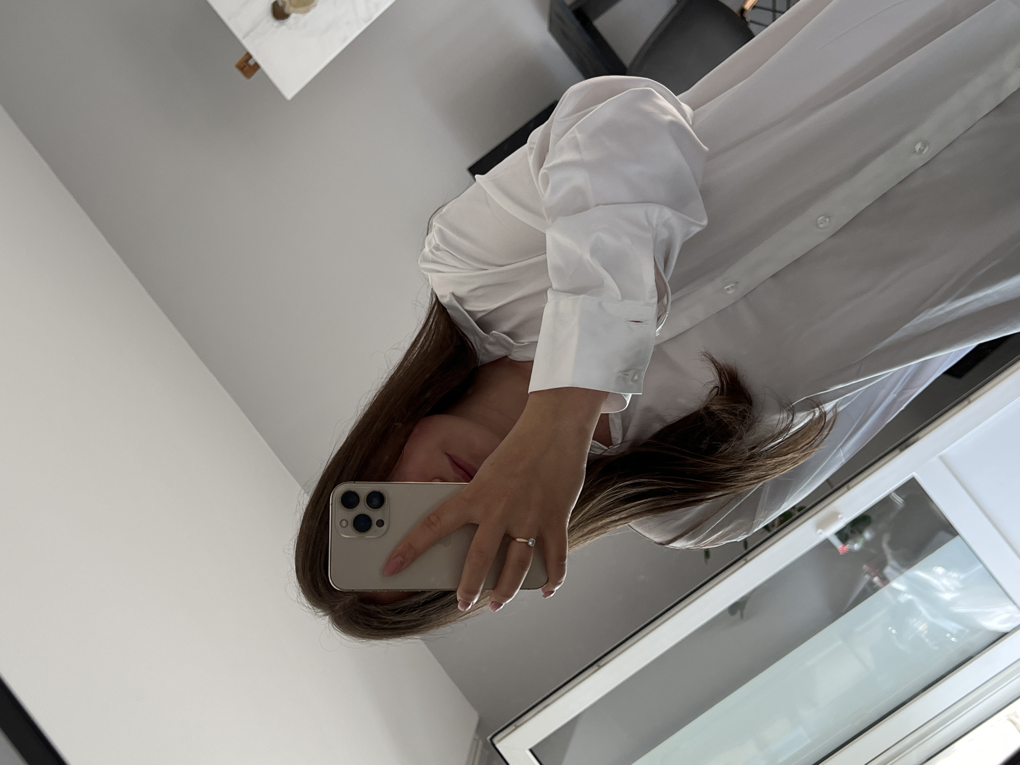 Woman takes early morning selfies in Ternopil, Ukraine