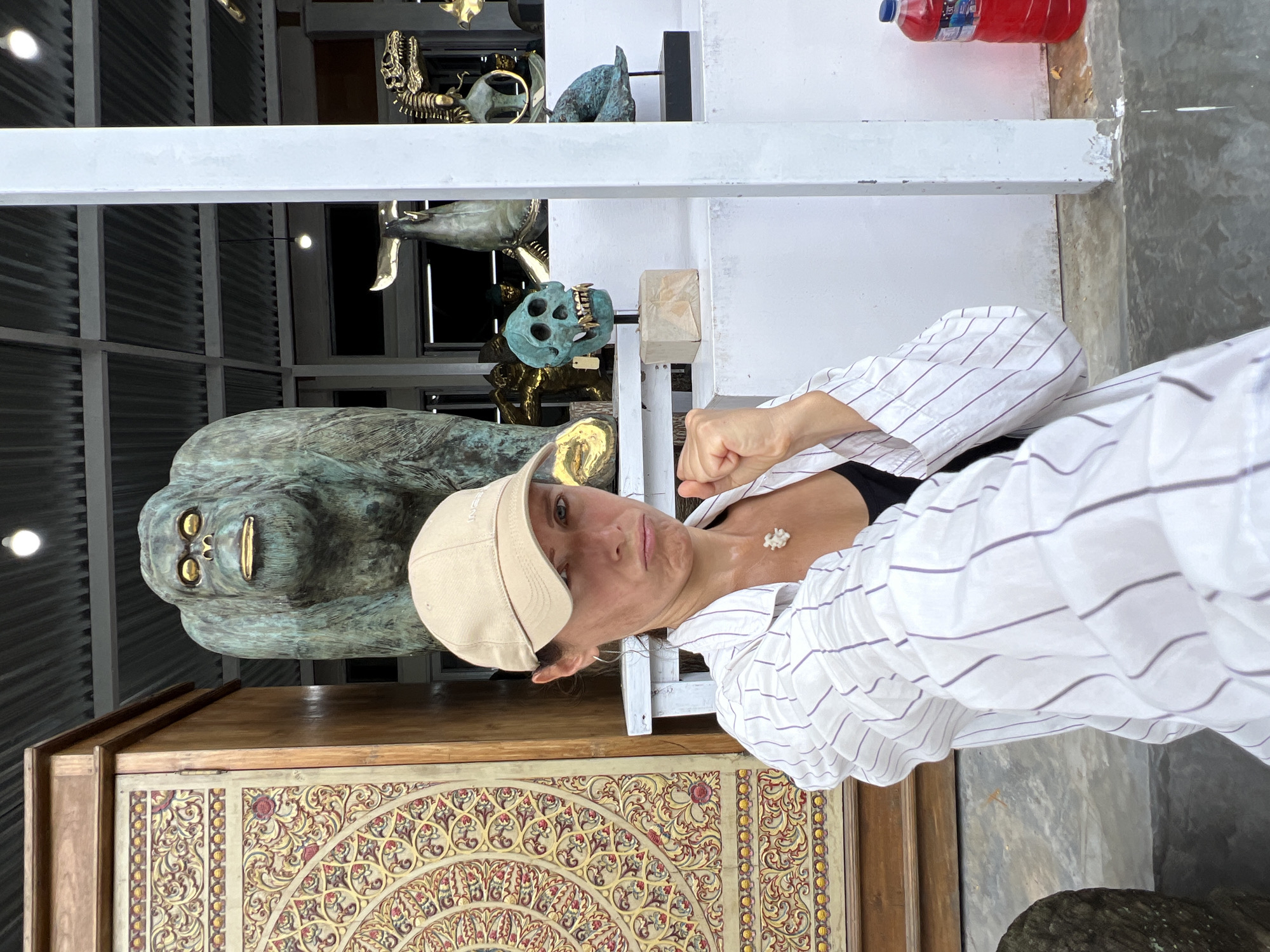 Tourists explore art galleries and sculpture workshops in Tegallalang