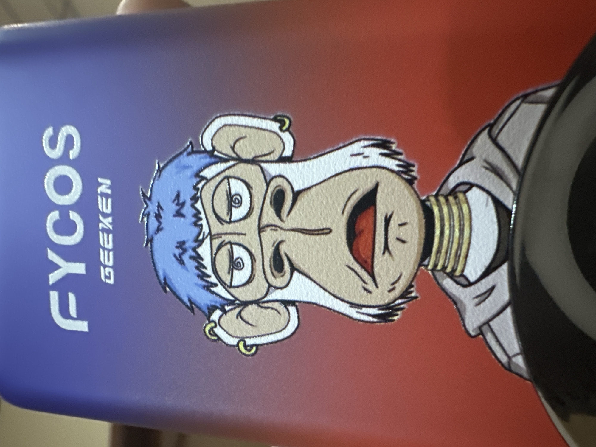Cartoon ape vape cartridge with gold accessories documented