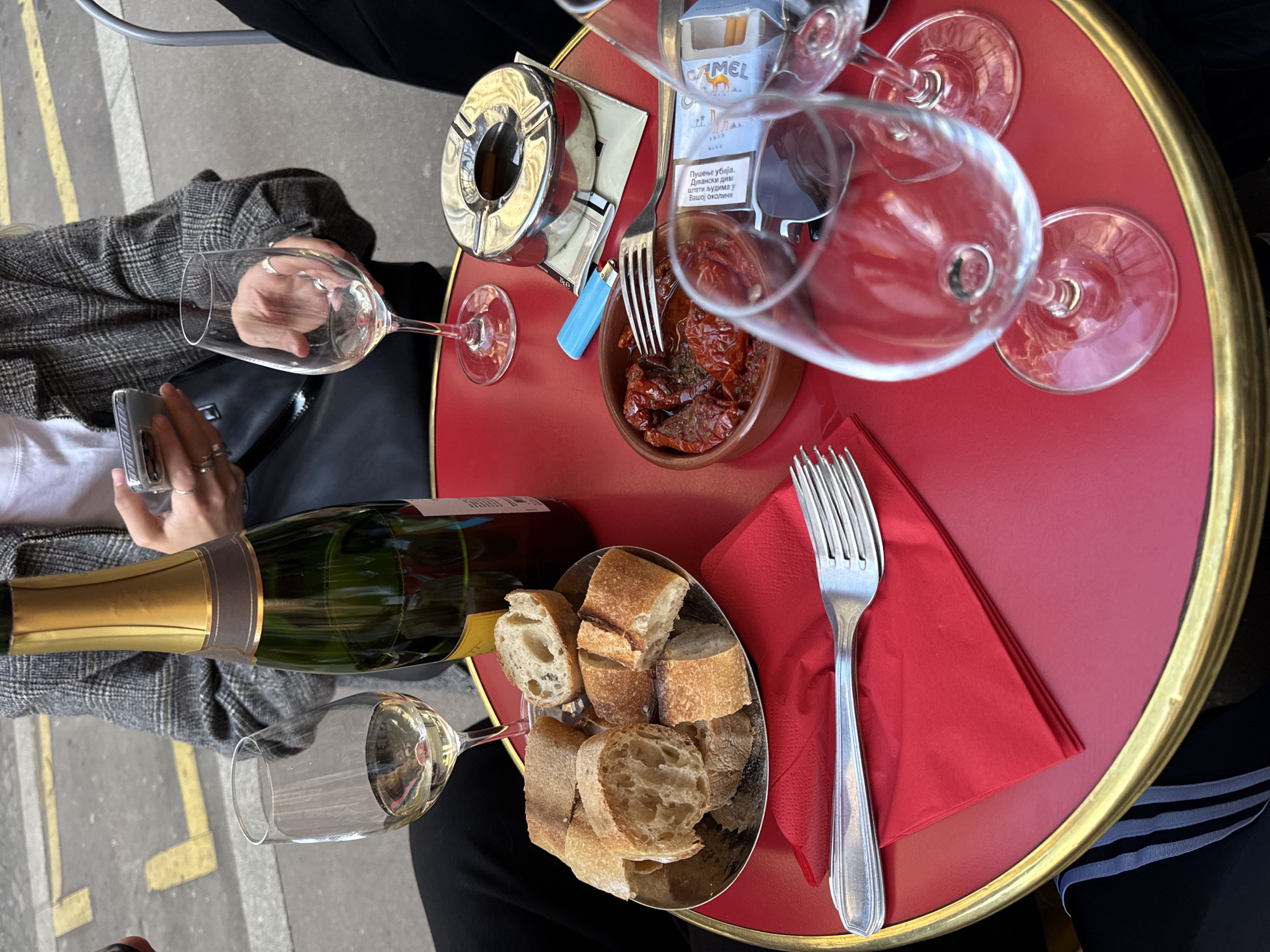 Parisian cafe scene captured during evening dining hour