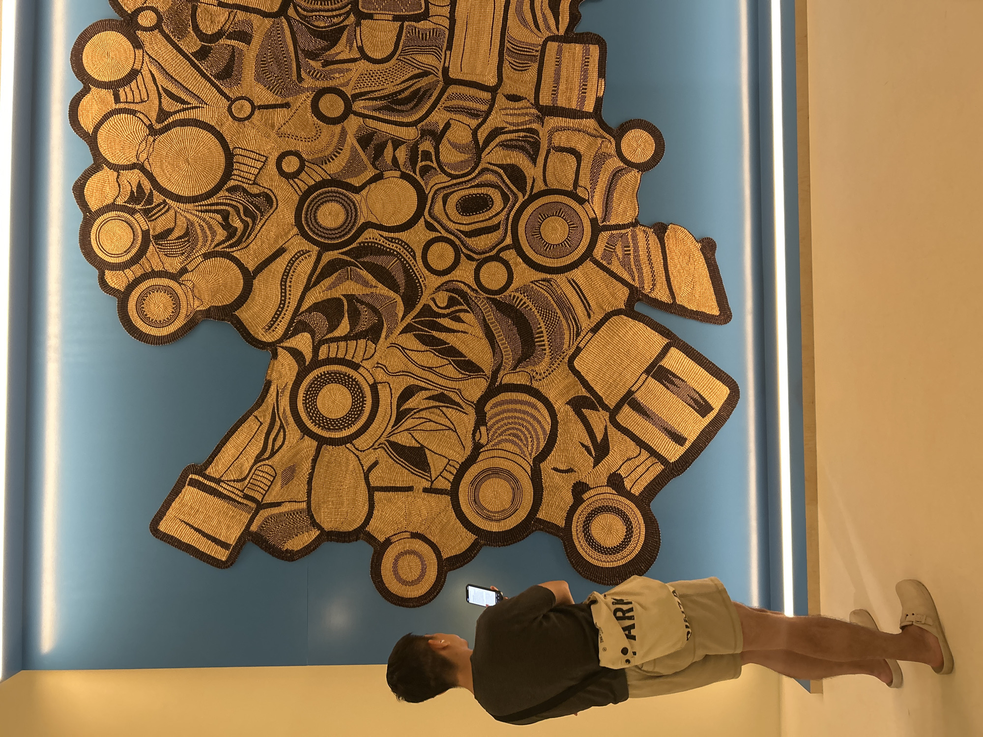 Visitor documents Loewe Foundation Craft Prize exhibition in Singapore