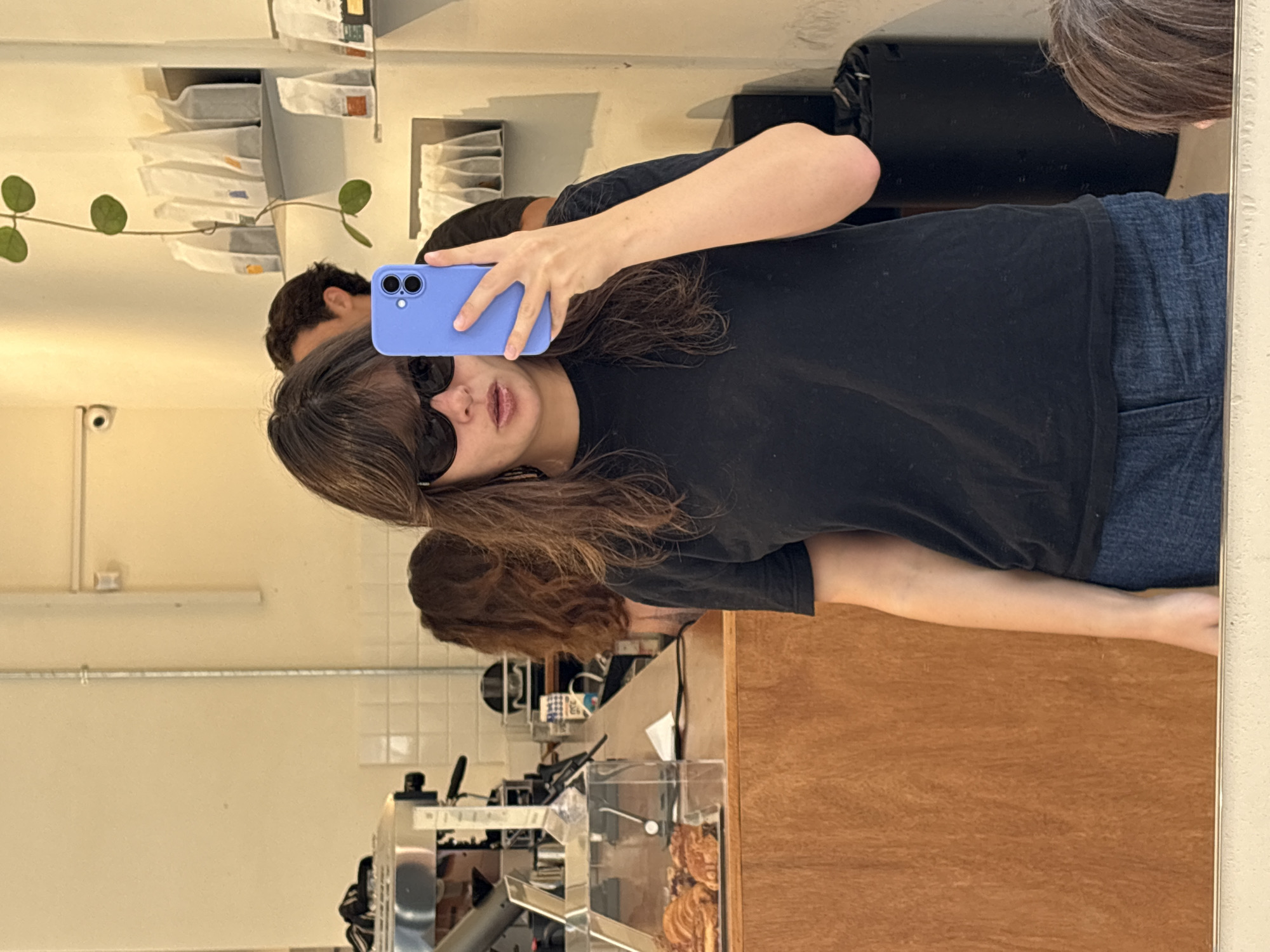Casual portraits inside a Tel Aviv café, mid-morning.