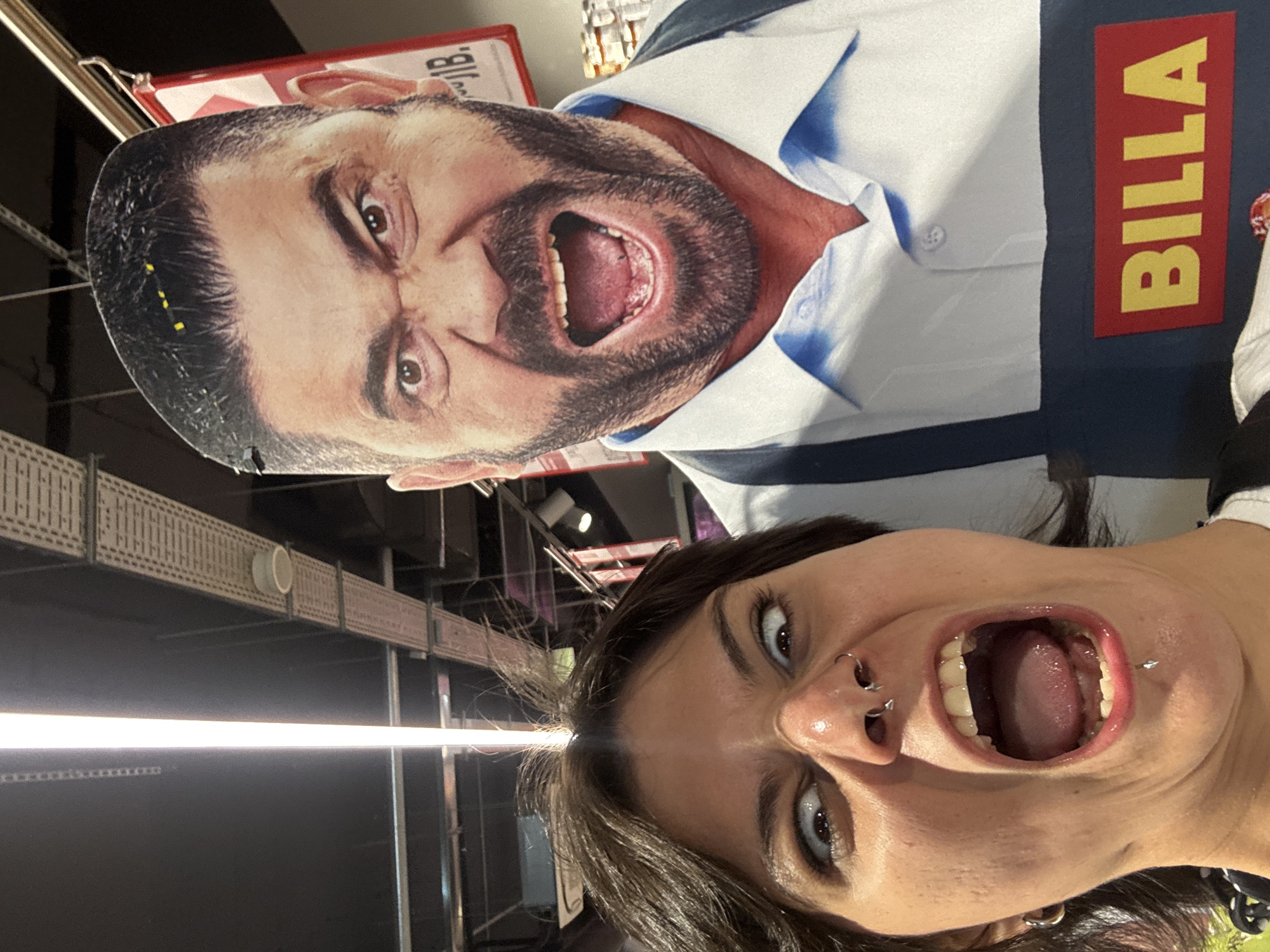 Woman poses with cardboard cutout figure in Sofia