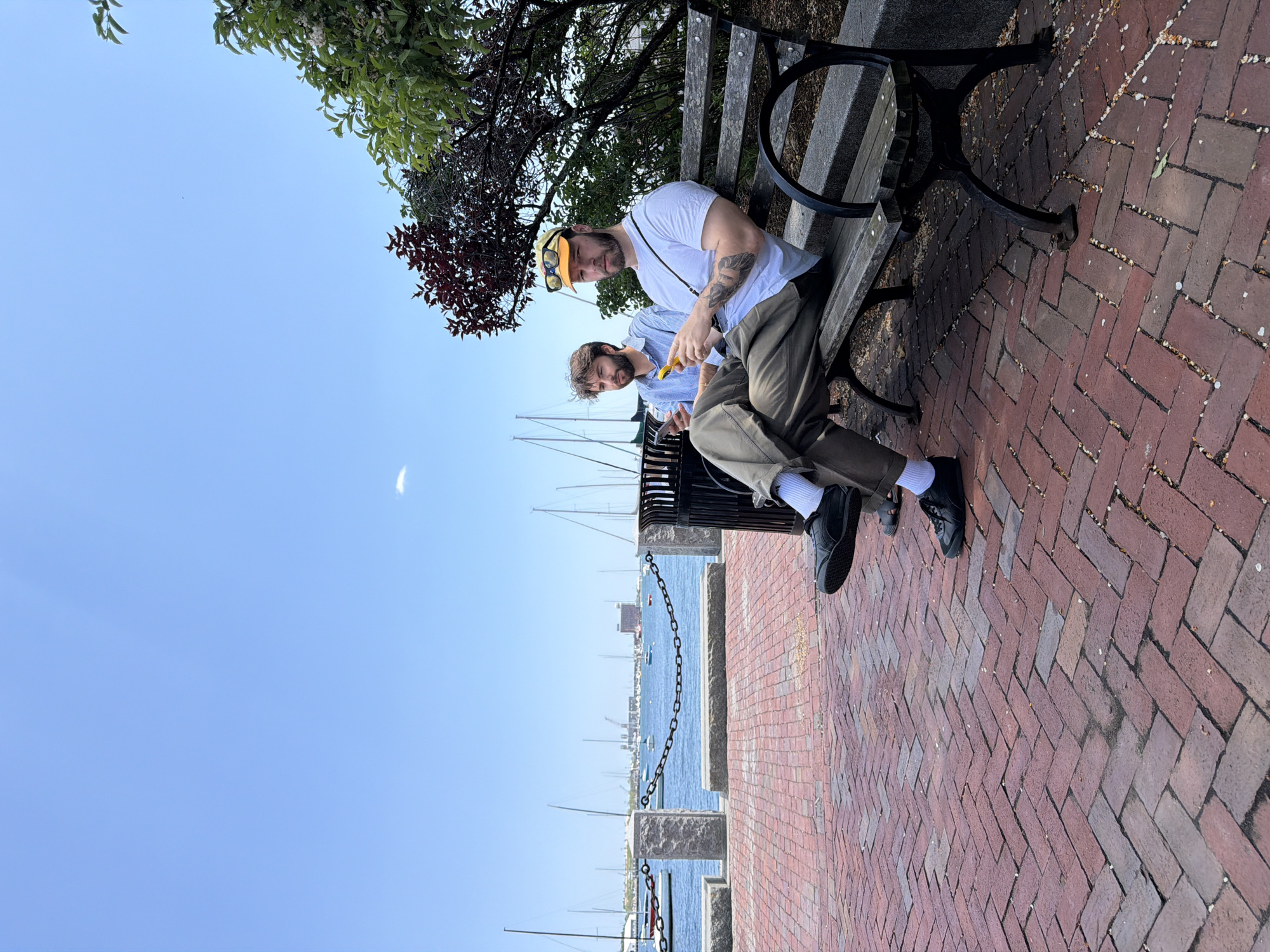 Ordinary afternoon activity captured along Boston waterfront promenade