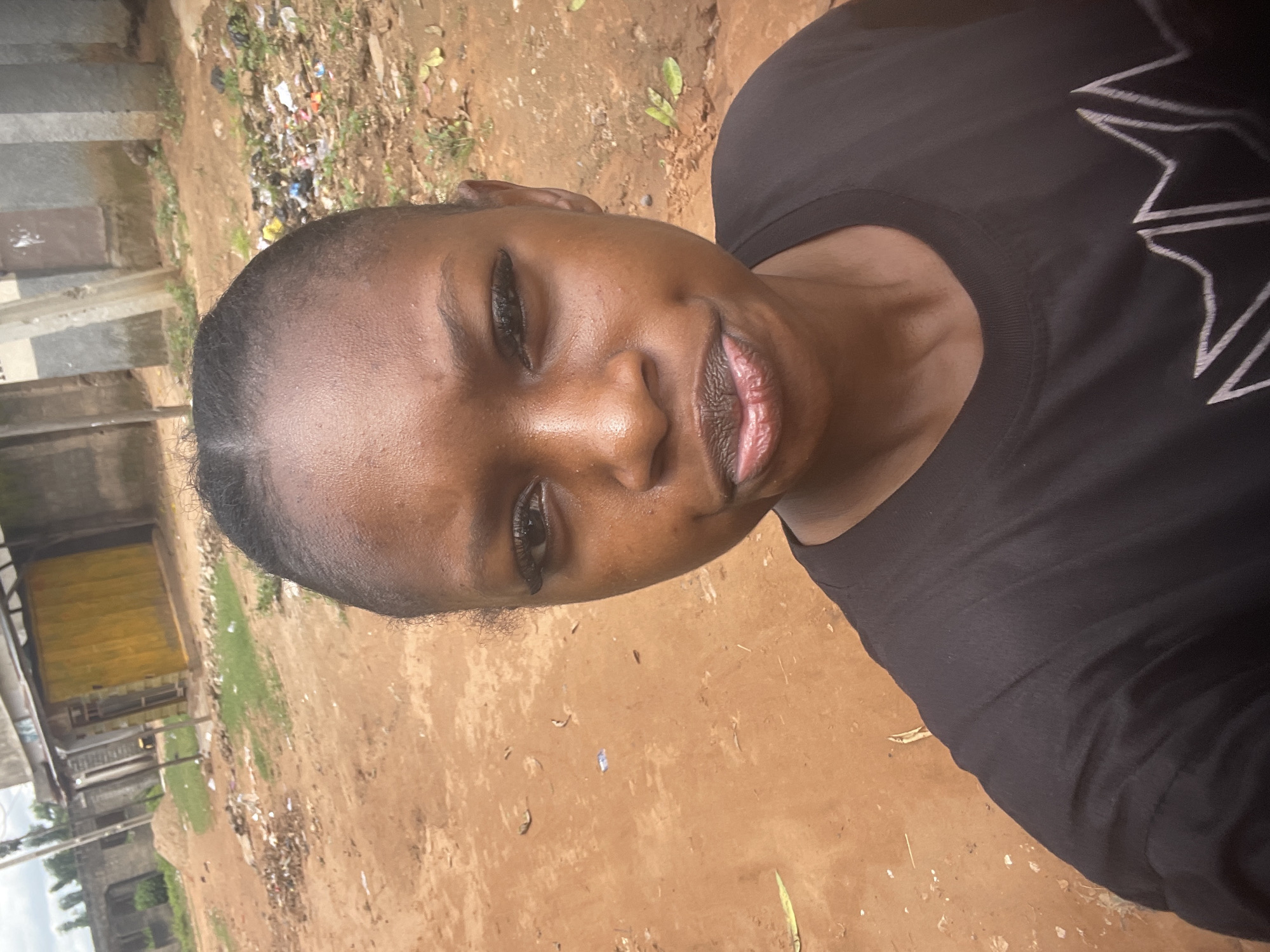 Quiet morning moments on a dusty street in Lafia, Nigeria
