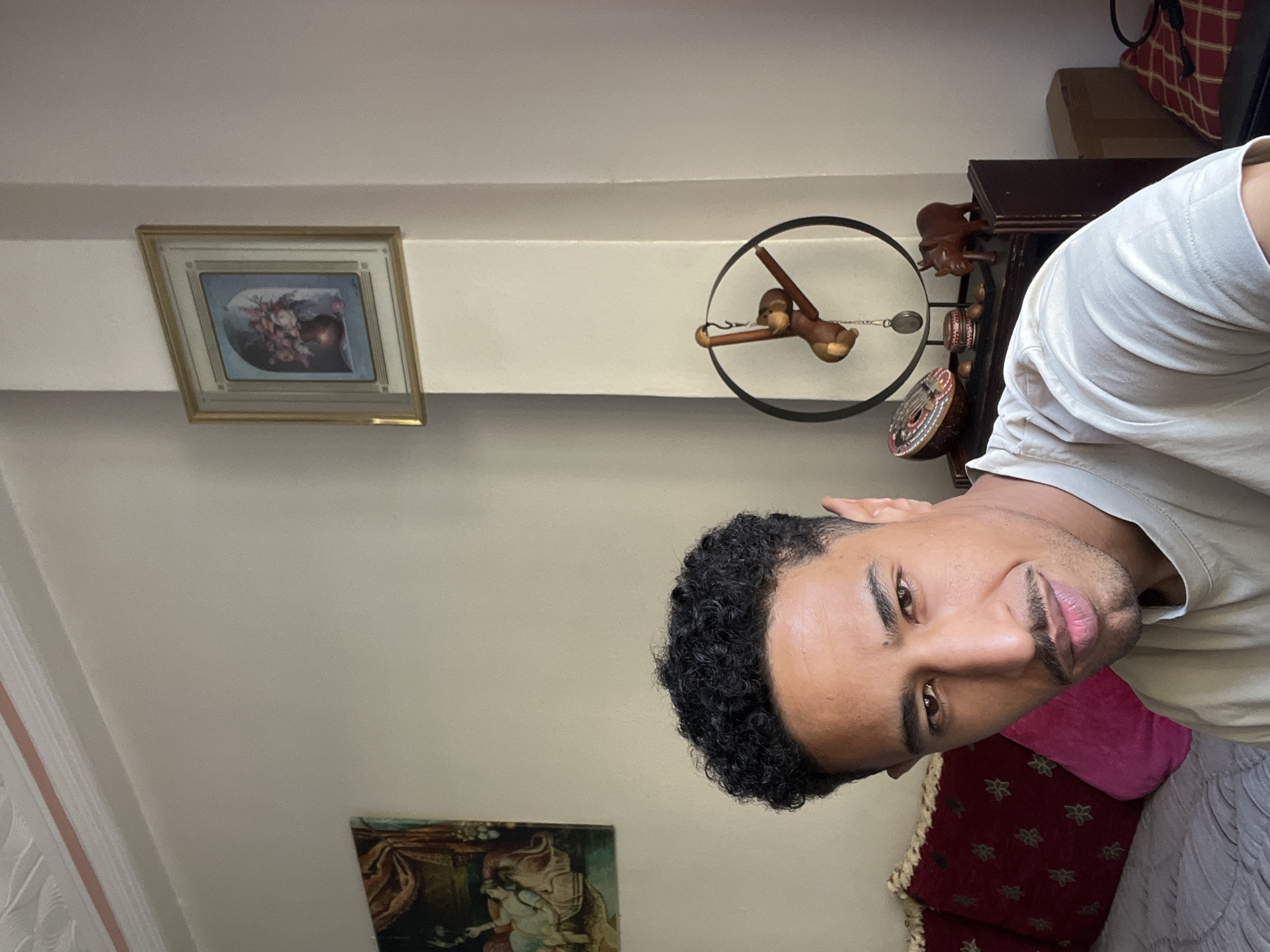 Man photographed in multiple indoor settings in Tangier