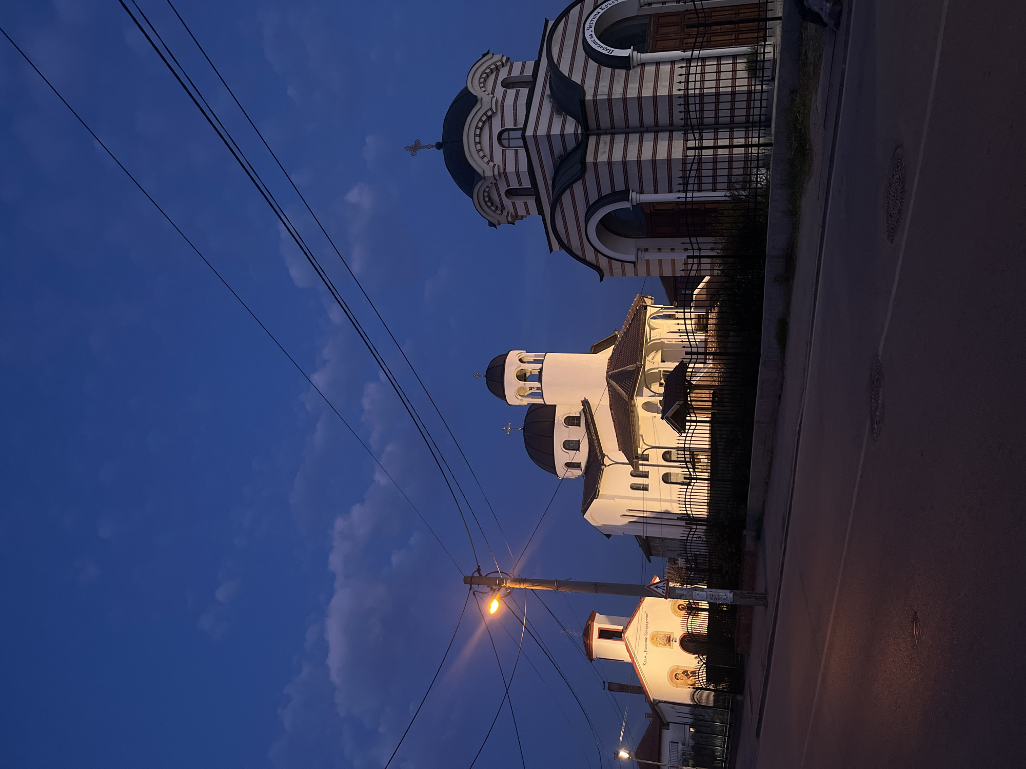 Evening street scene captures Orthodox churches in Sofia, Bulgaria